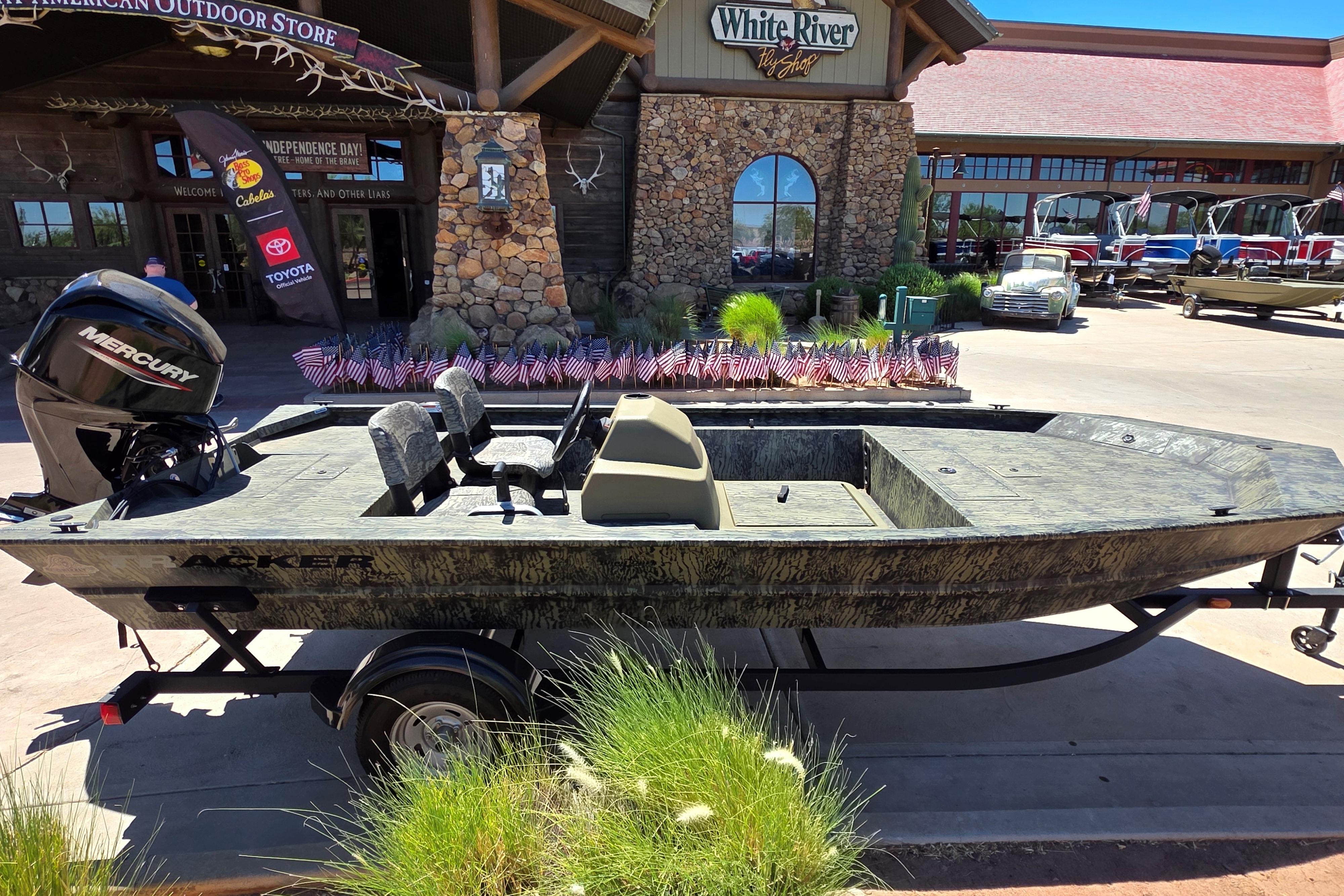 2026 Tracker Grizzly 1754 SC boat displayed outside White River Fly Shop.