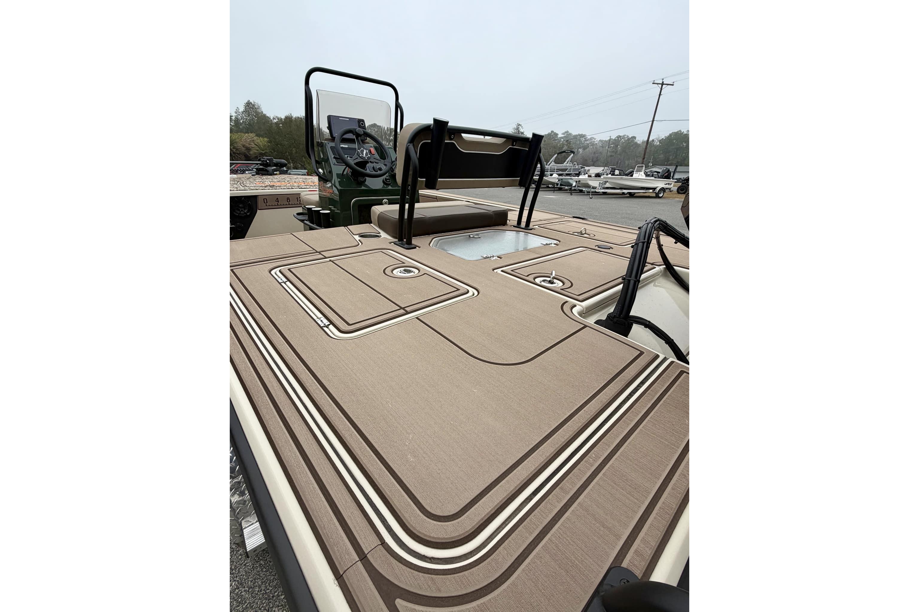 2025 Mako 18 Pro Skiff Backwater Edition boat with sleek deck design.