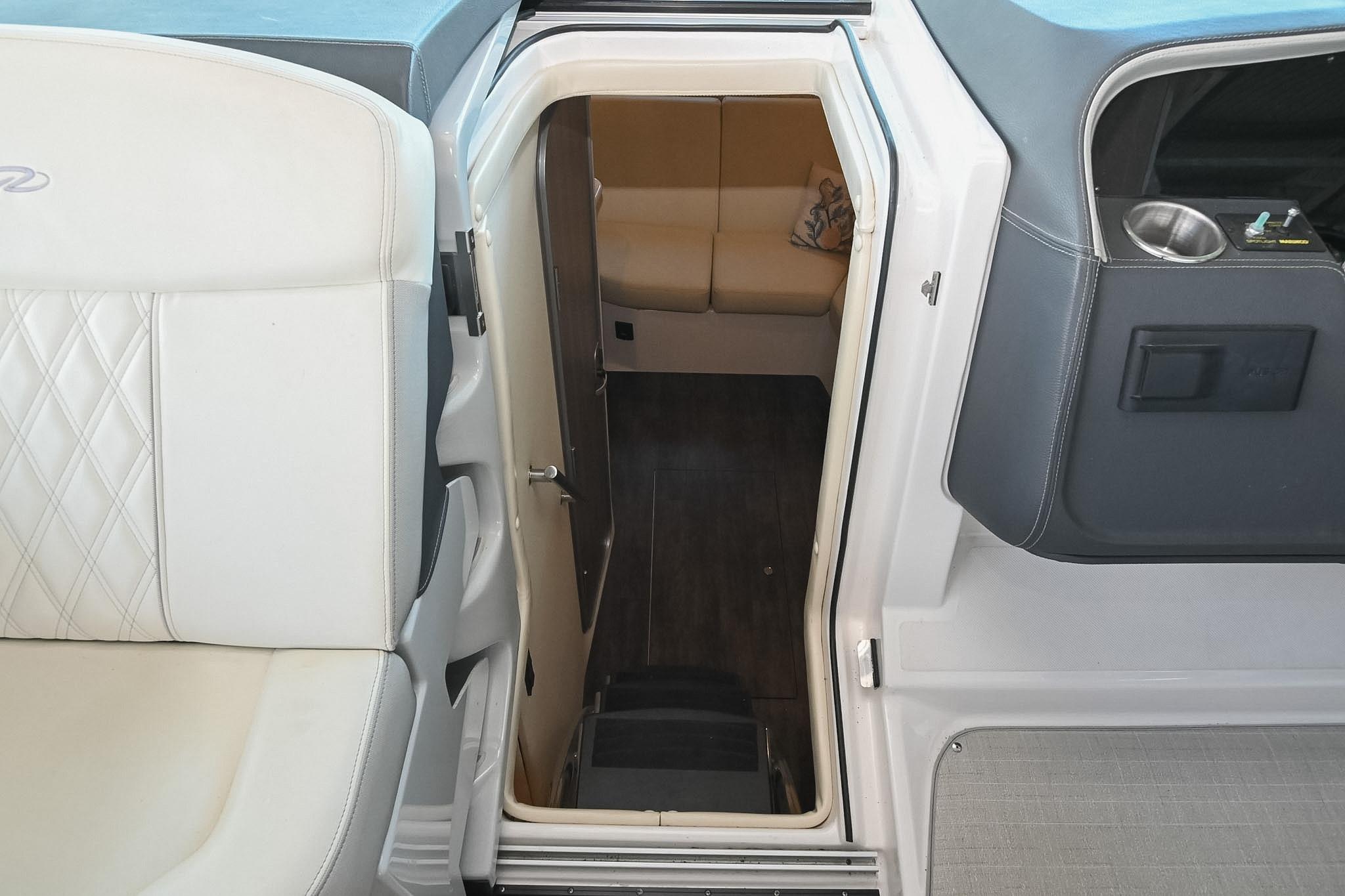 Interior view of a 2021 Regal 33 Express boat cabin entrance.