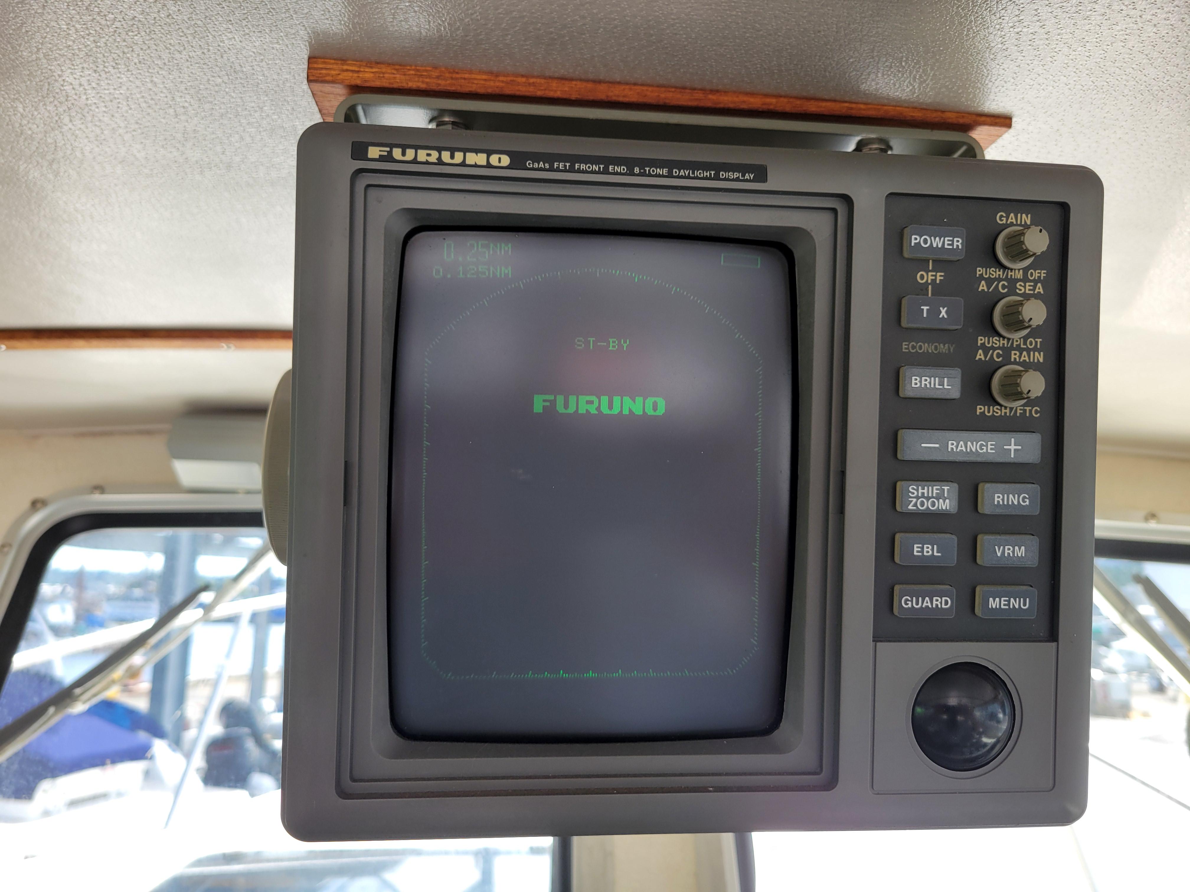 Furuno radar display on 1999 SeaSport 2400 XL Limited boat dashboard.