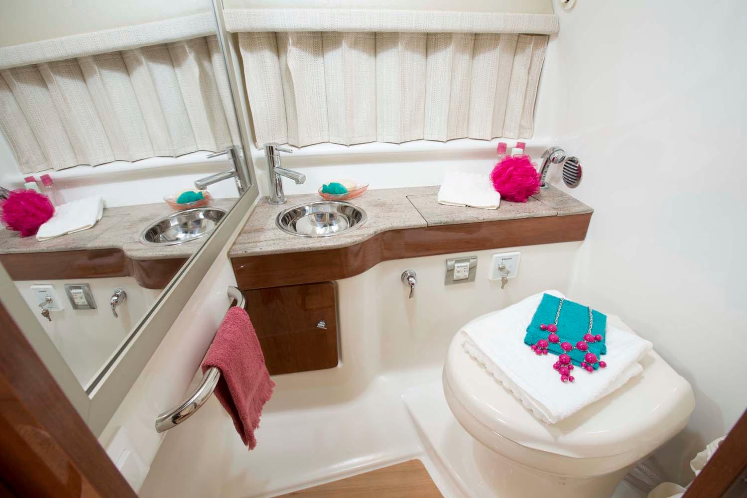 Manufacturer Provided Image: 2017 Formula 310 Sun Sport bathroom with sink, toilet, and mirror.