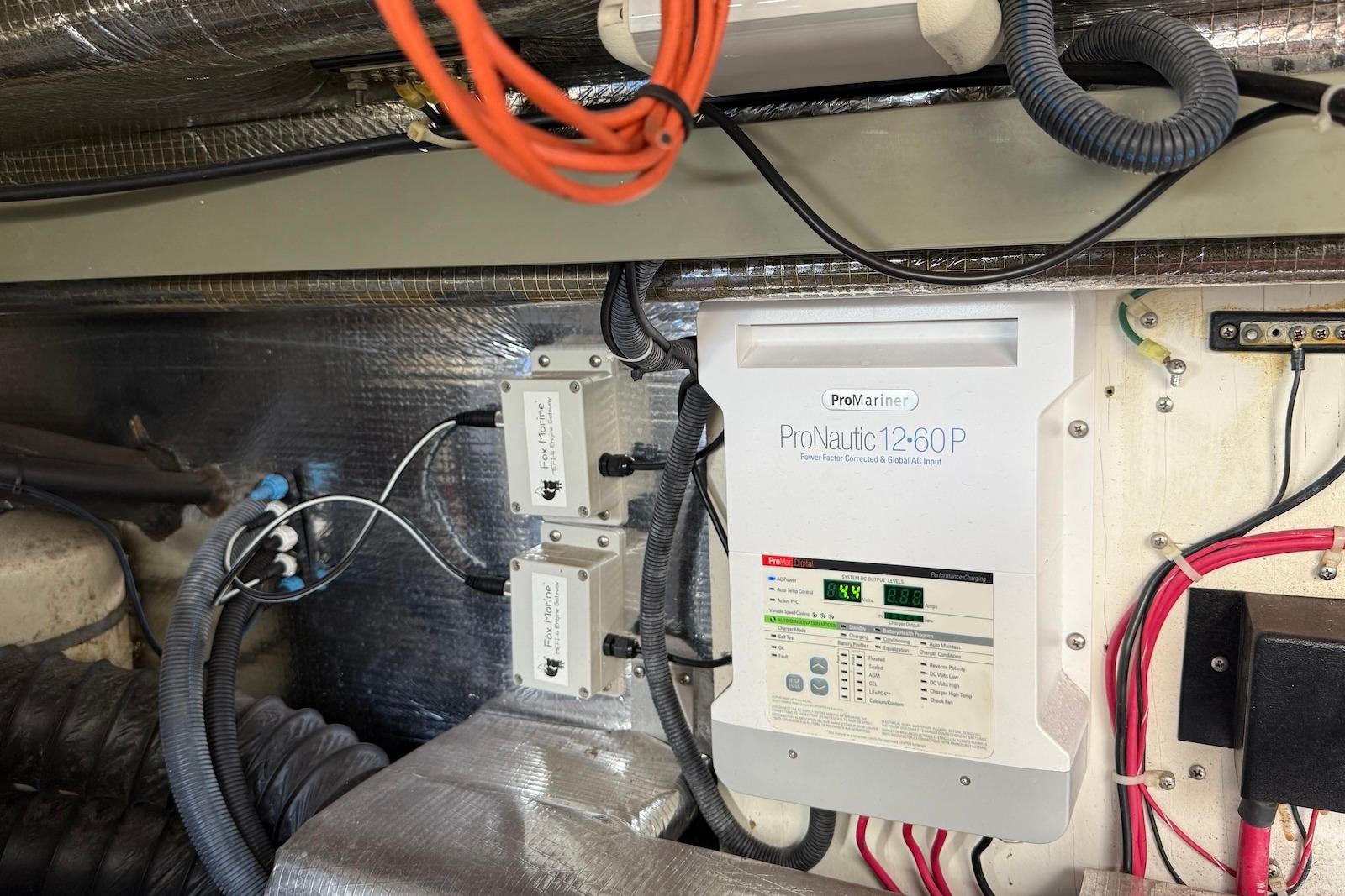 Electrical system of a 2003 Regal Commodore 3880 boat, featuring ProMariner ProNautic charger.