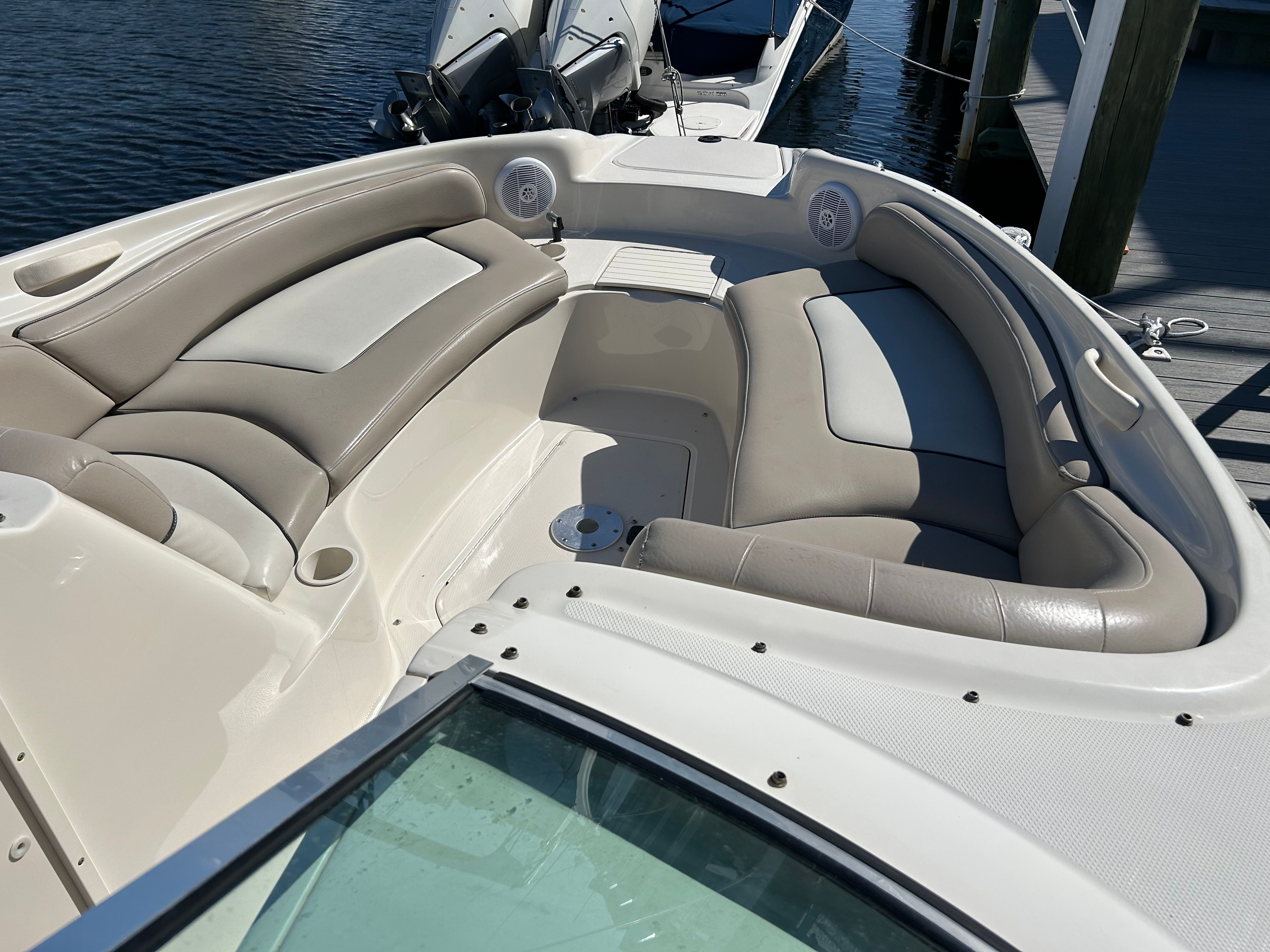 Interior of a 2003 Sea Ray 240 Sundeck boat at the dock.