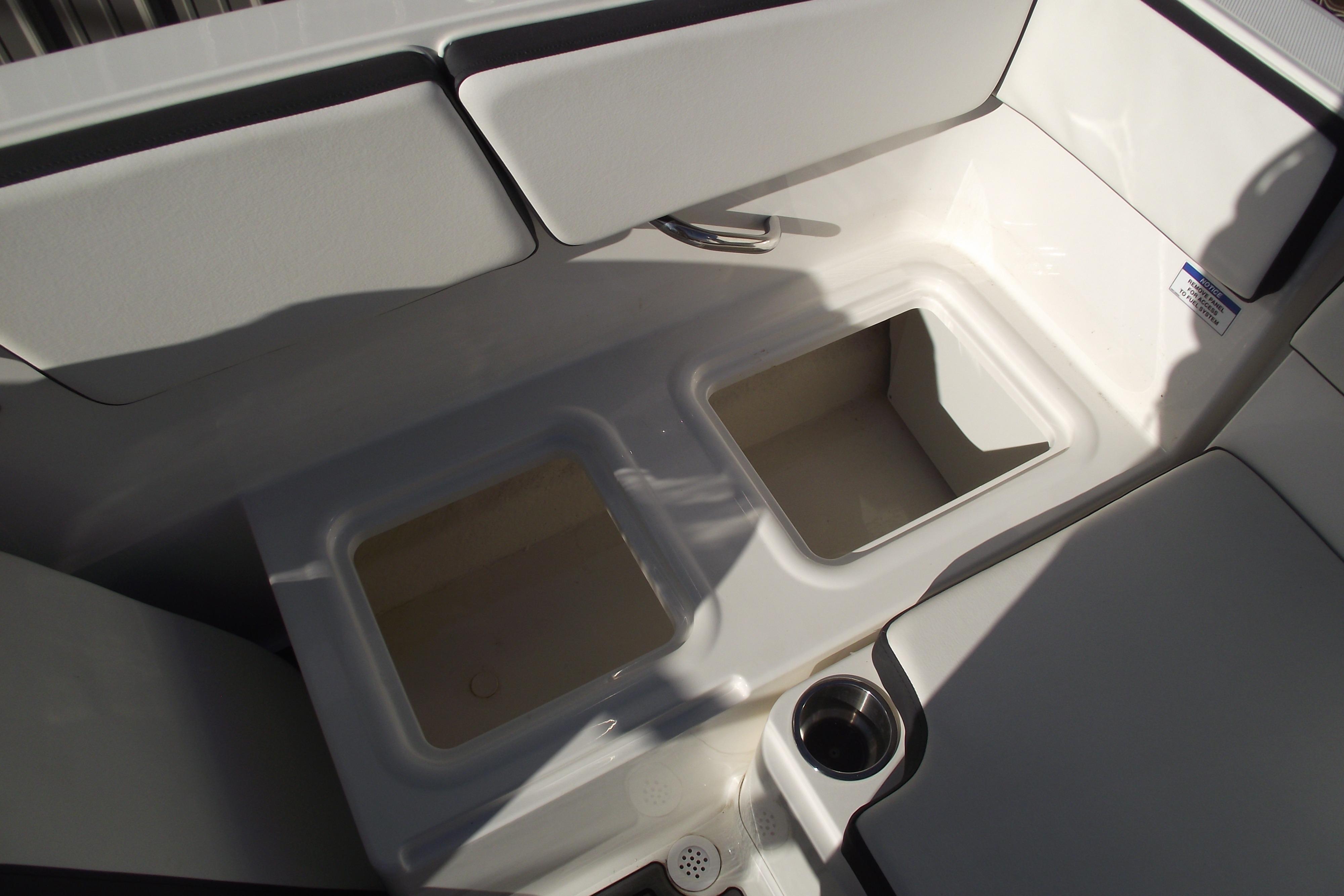 2022 Bayliner VR4 Bowrider OB interior storage compartments and cup holder.