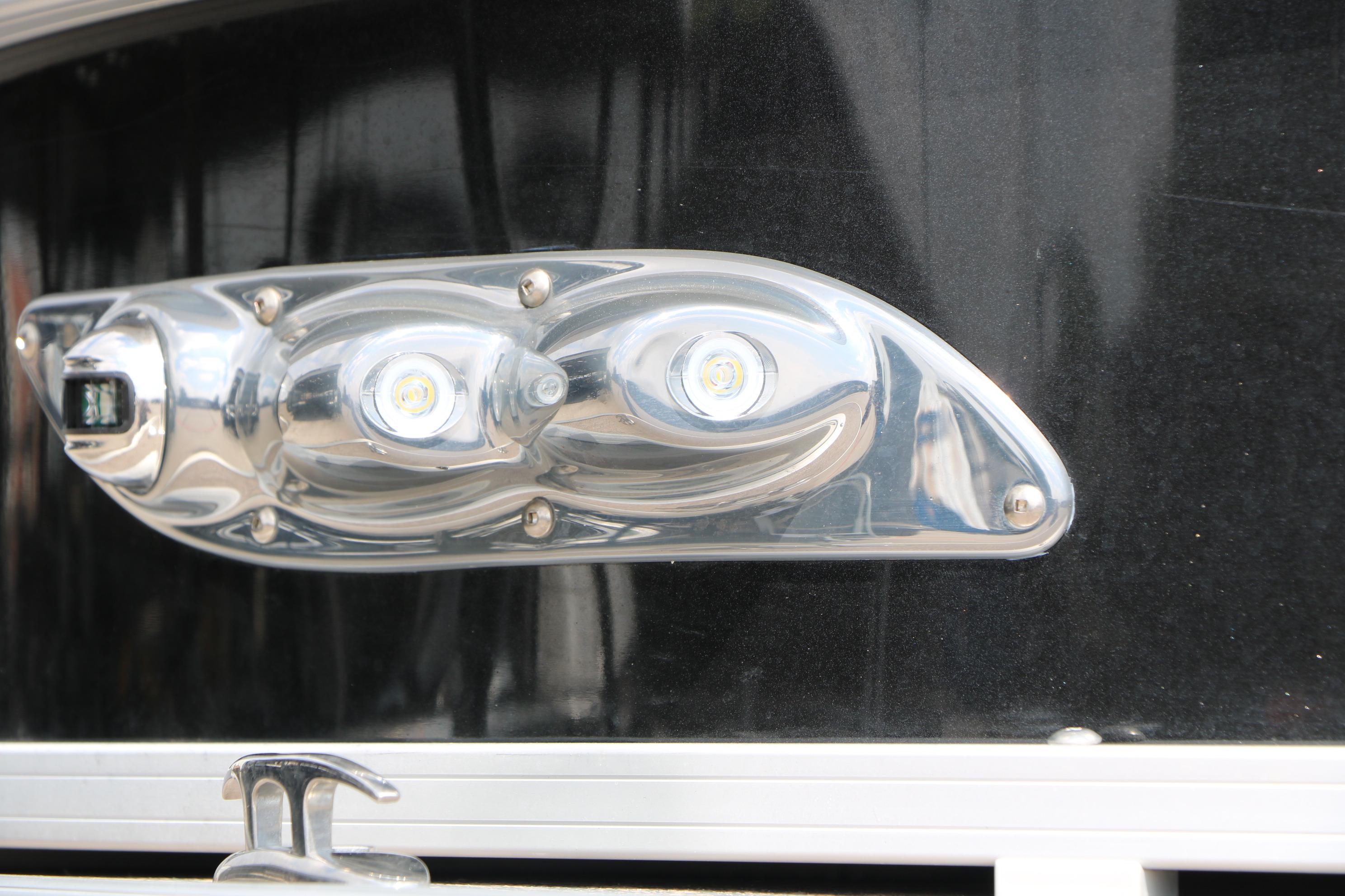 LED light fixture on 2021 Ranger 223FC boat exterior.