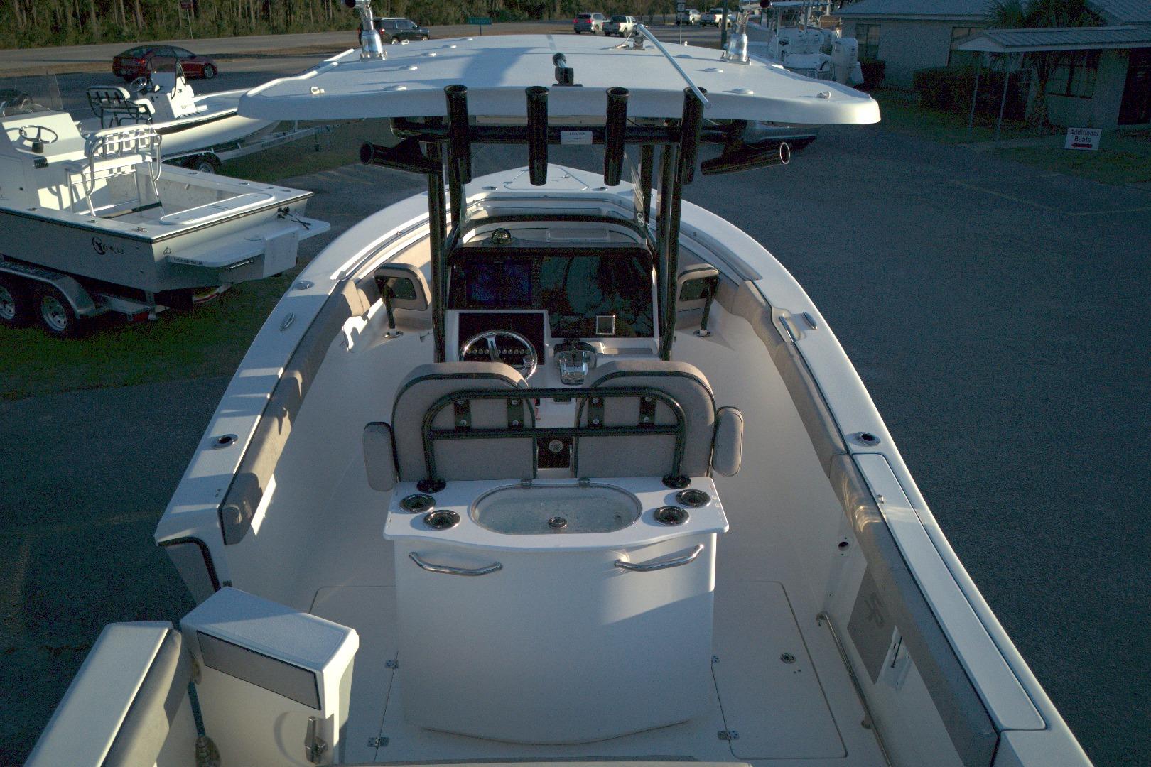 2021 Sea Pro 259 Center Console boat, top view, showcasing helm and seating area.