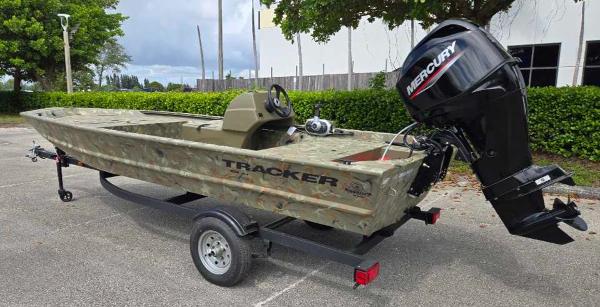 2025 Tracker Grizzly 1648 SC boat with Mercury engine on trailer.