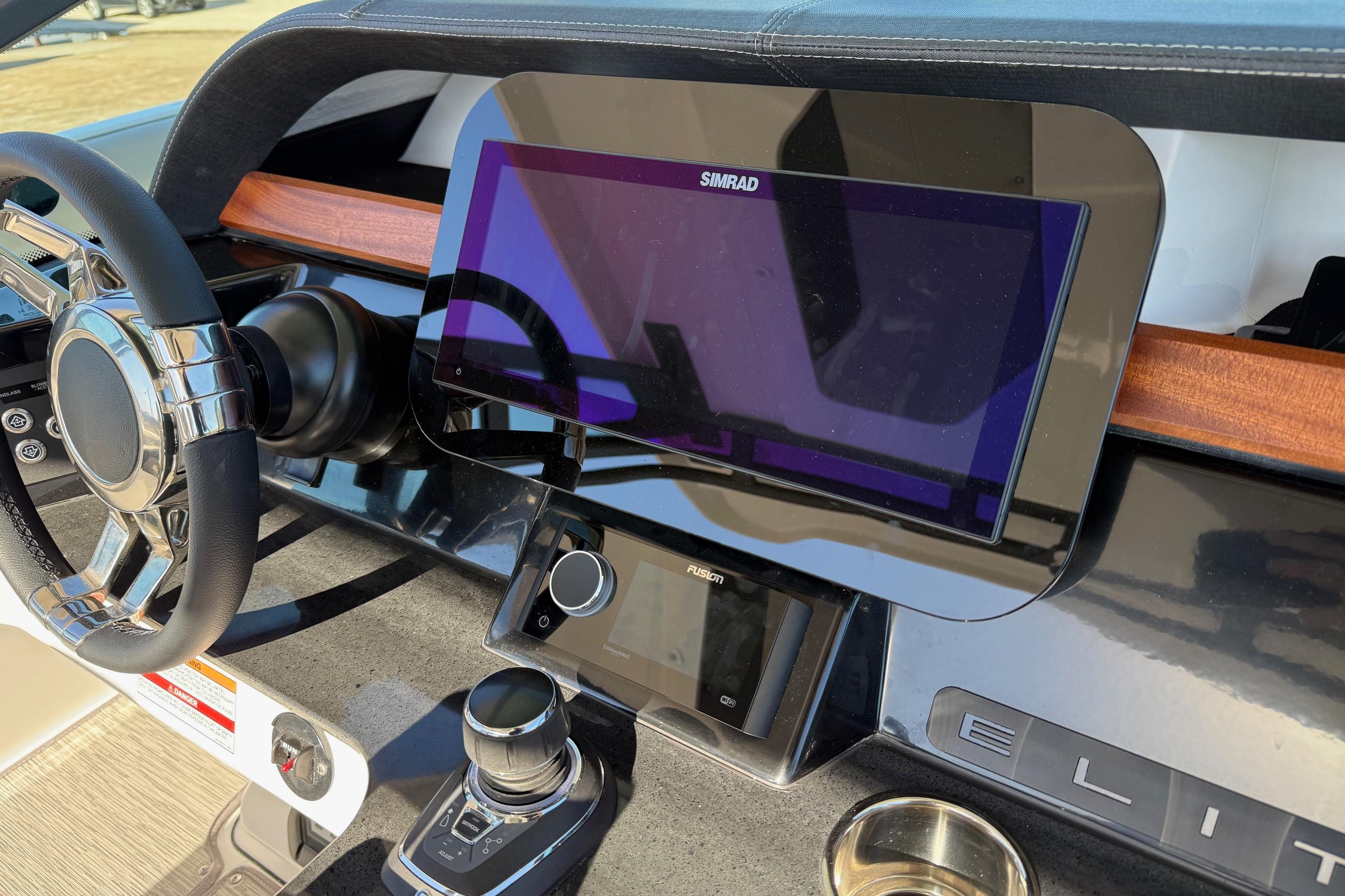 Dashboard of 2026 Monterey Elite 30 OB with Simrad display.