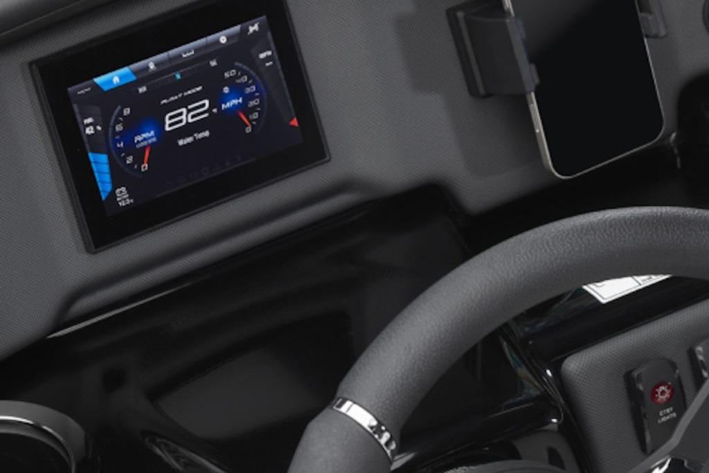 Dashboard of 2026 Yamaha Boats SX195 featuring digital speedometer and steering wheel.