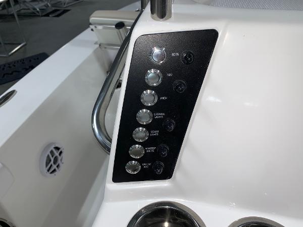 Control panel of 2026 Robalo 226 Cayman boat with labeled switches.