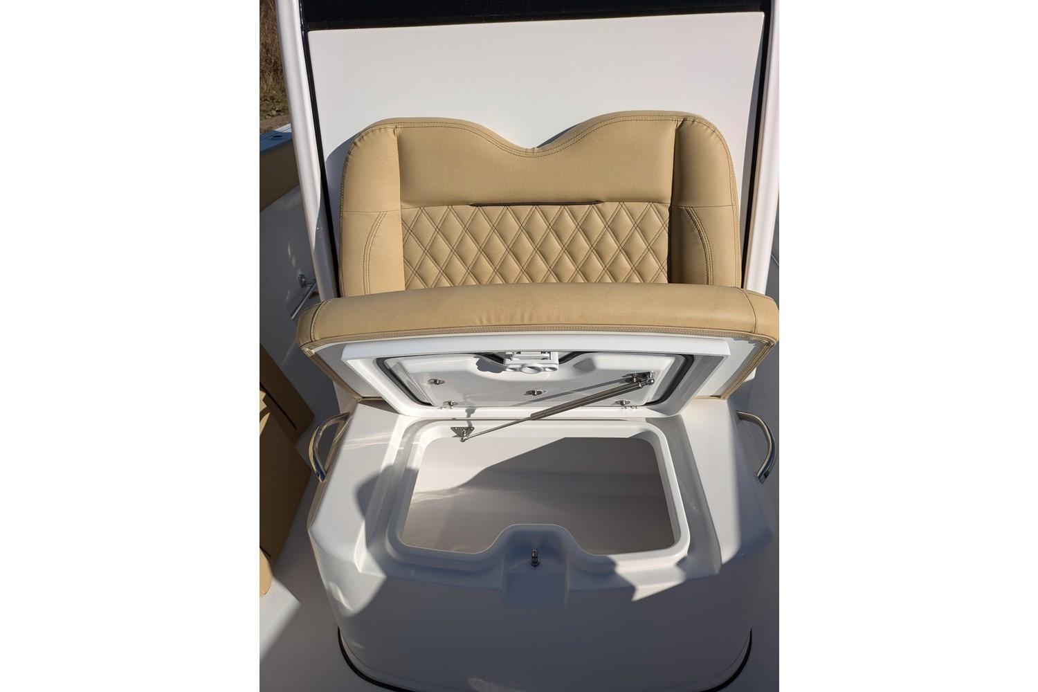 2025 Sportsman Open 282 Center Console seat with storage compartment open.