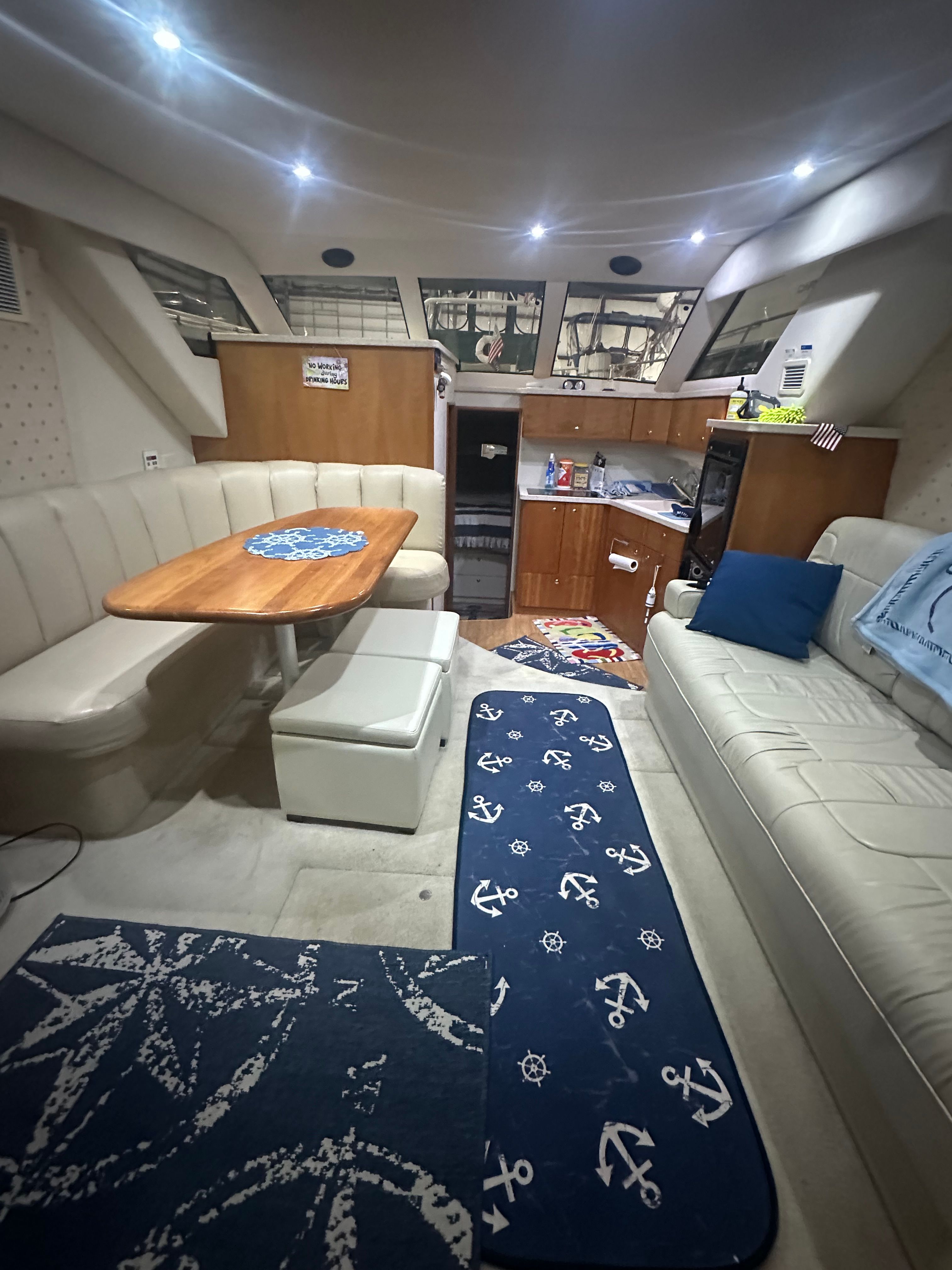 Interior of a 2000 Silverton 351 Sedan yacht with cozy seating area.