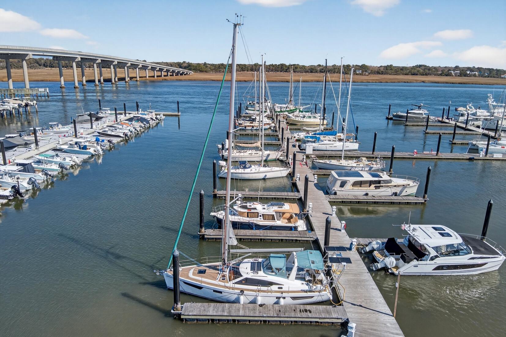 Marina with Southerly 420 sailboat, 2024 model, docked among various boats.