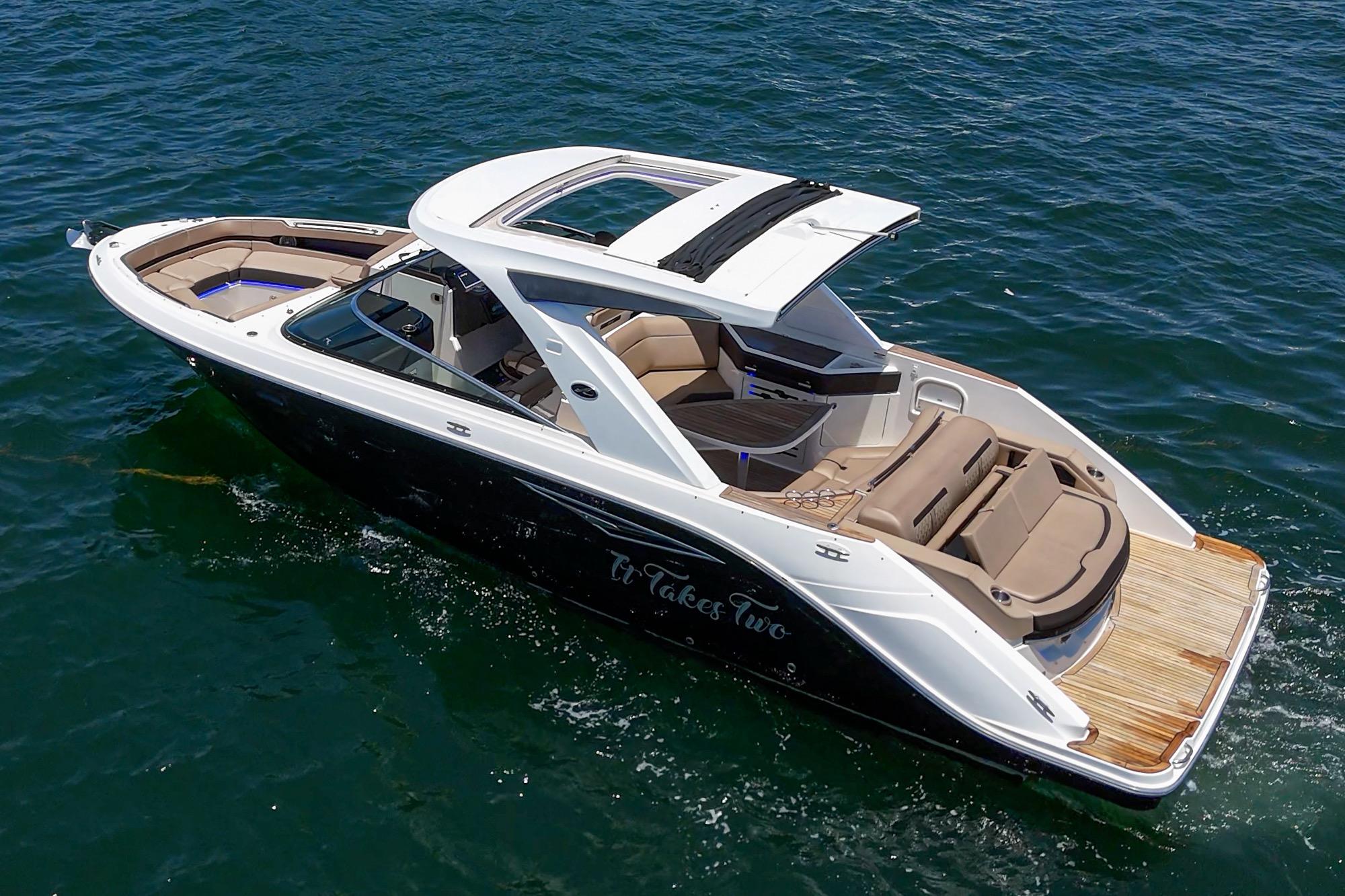 2018 Sea Ray SLX 310 luxury boat cruising on open water.