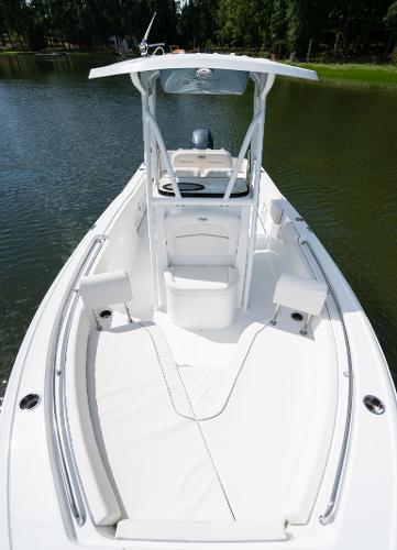 2024 Sea Hunt Ultra 234 boat on calm water.
