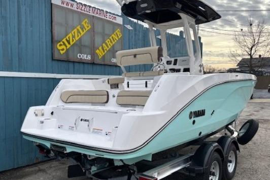2026 Yamaha Boats 222 FSH Sport E on trailer, displayed at Sizzle Marine dealership.