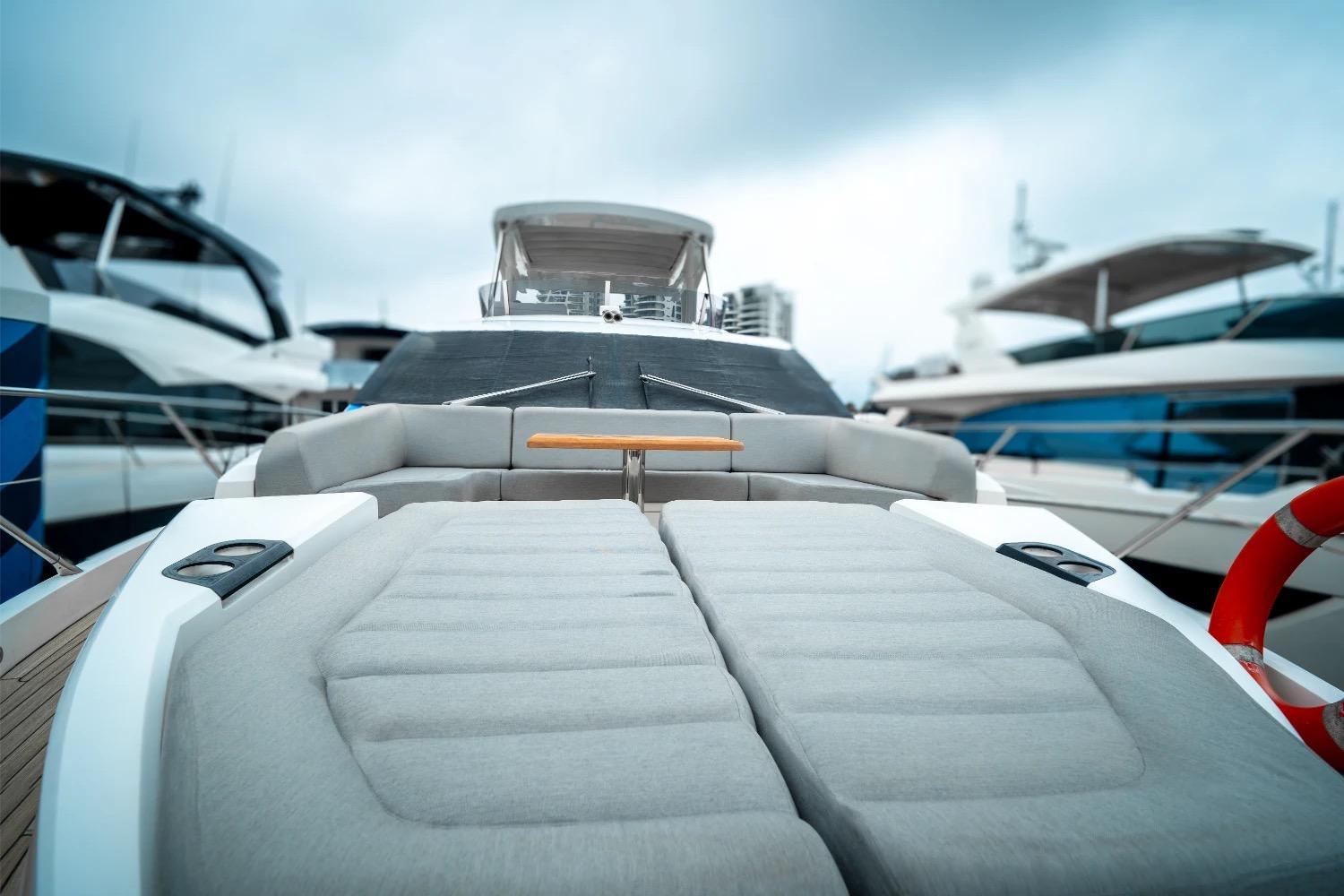 Luxurious 2018 Sunseeker Manhattan 66 yacht with spacious deck and modern design.
