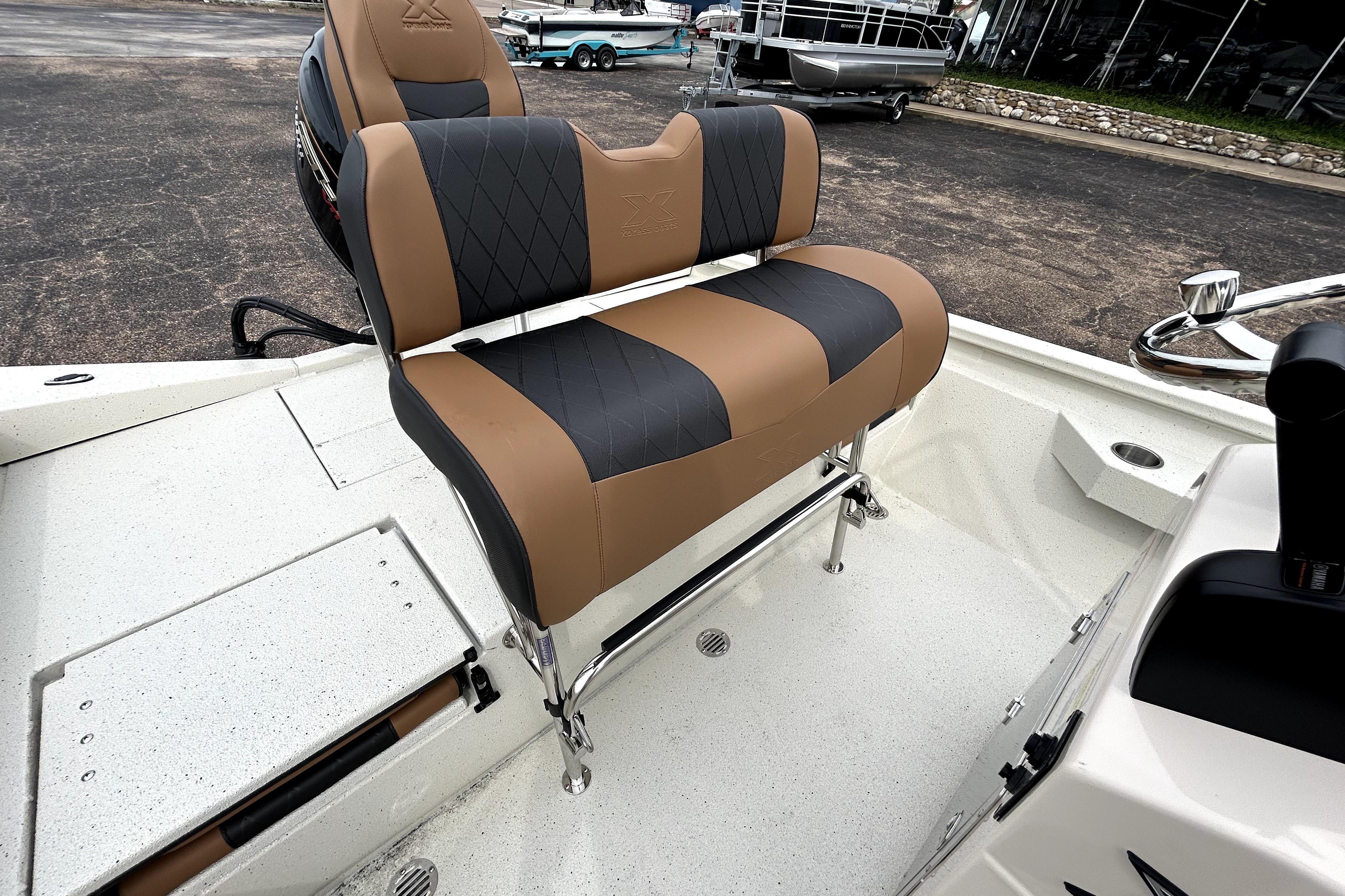 2026 Xpress H20B Bay boat with stylish tan and black seating.