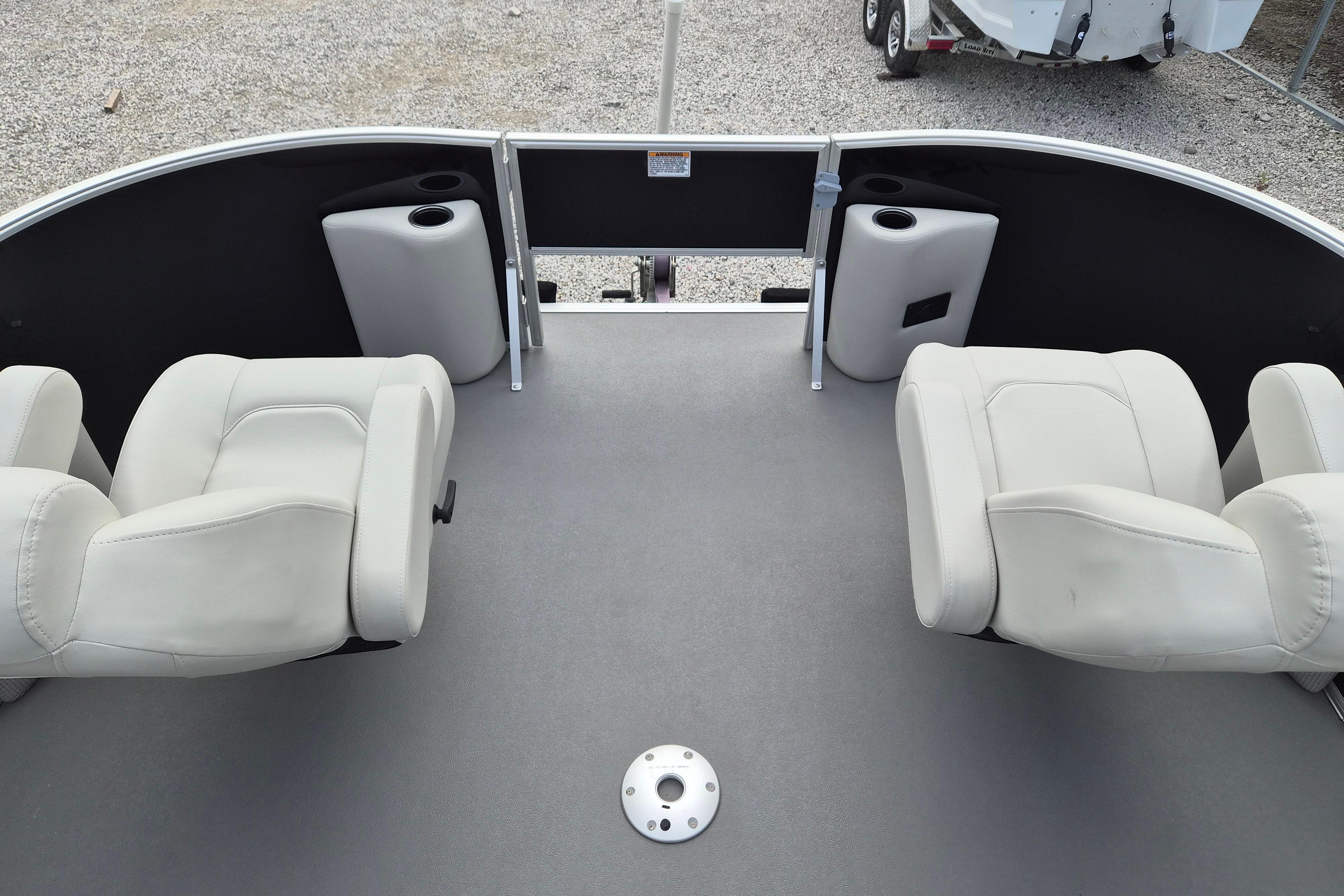 2025 Sylvan Mirage Fish 8522 Party Fish 4.0 boat interior with seating and cup holders.
