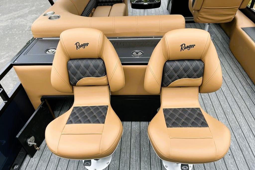Luxury seating on 2026 Ranger 220FC boat with tan and black upholstery.