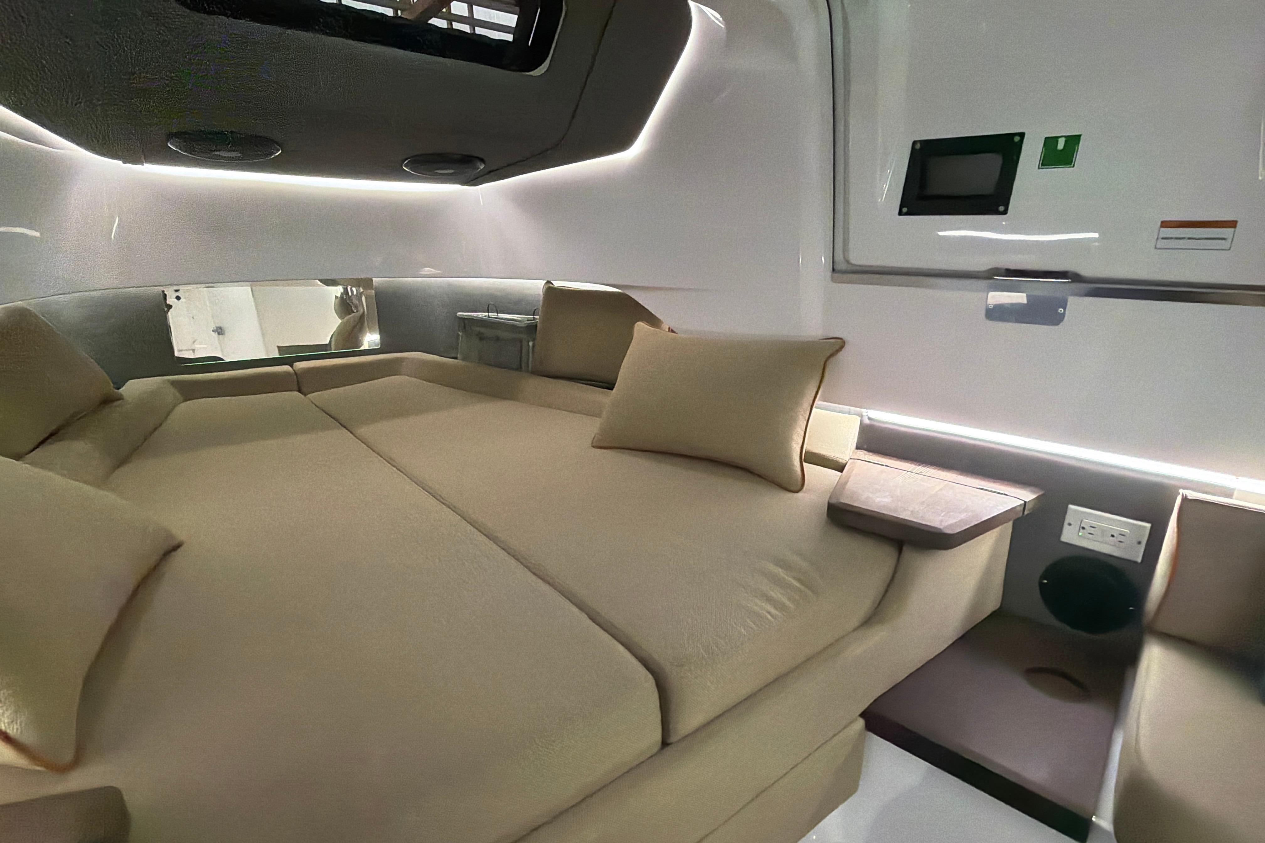 Luxurious interior cabin of 2022 Axopar Brabus 37 XC Cross Cabin with modern amenities.