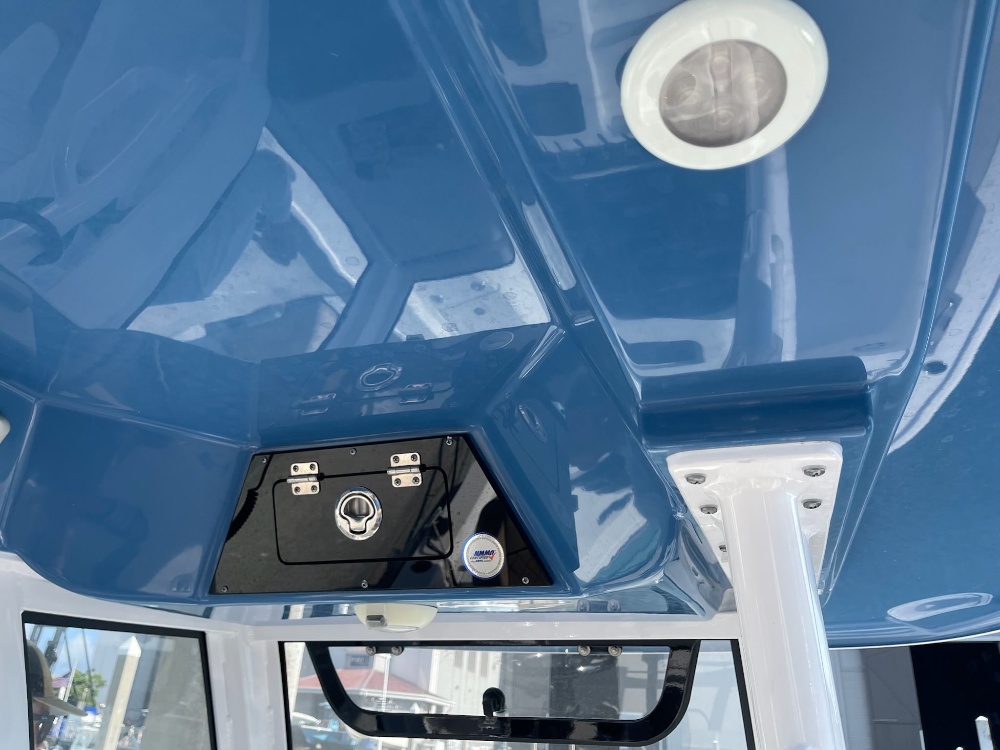 The image shows the blue roof of a Sportsman Masters 247 Bay Boat with a built-in speaker.