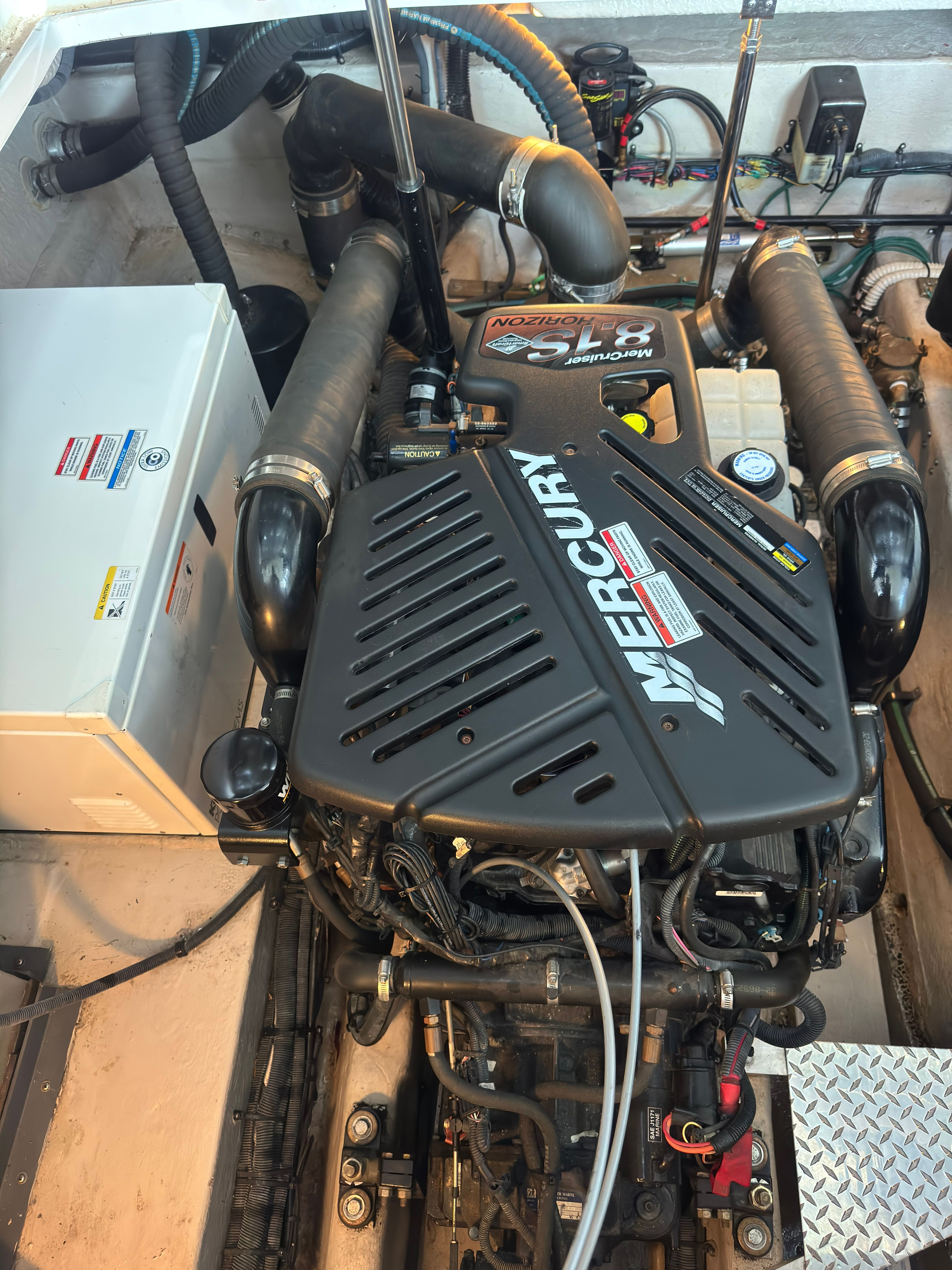 Engine compartment of a 2007 Sea Ray 40 Sundancer with a Mercury engine.