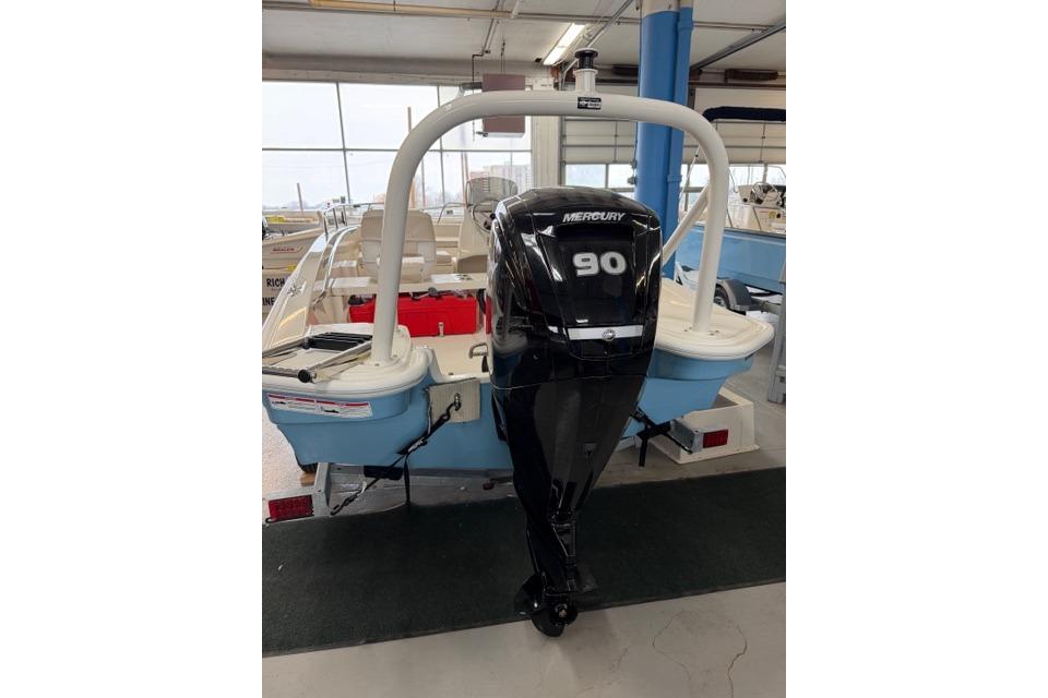 2026 Boston Whaler 160 Super Sport with Mercury 90 outboard motor in showroom.