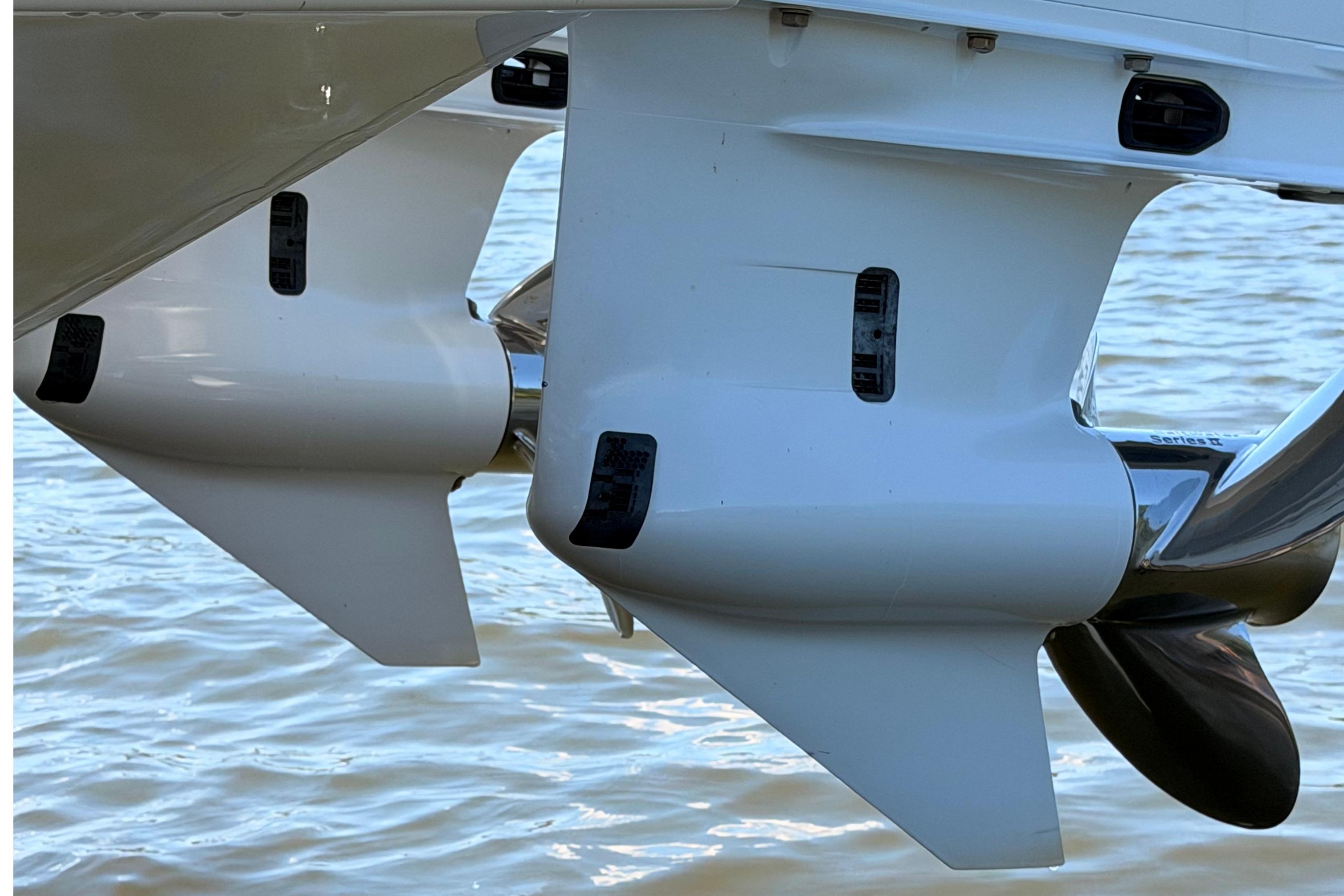Twin outboard motors on a 2024 Sea Hunt Gamefish 27 Coffin Box boat.