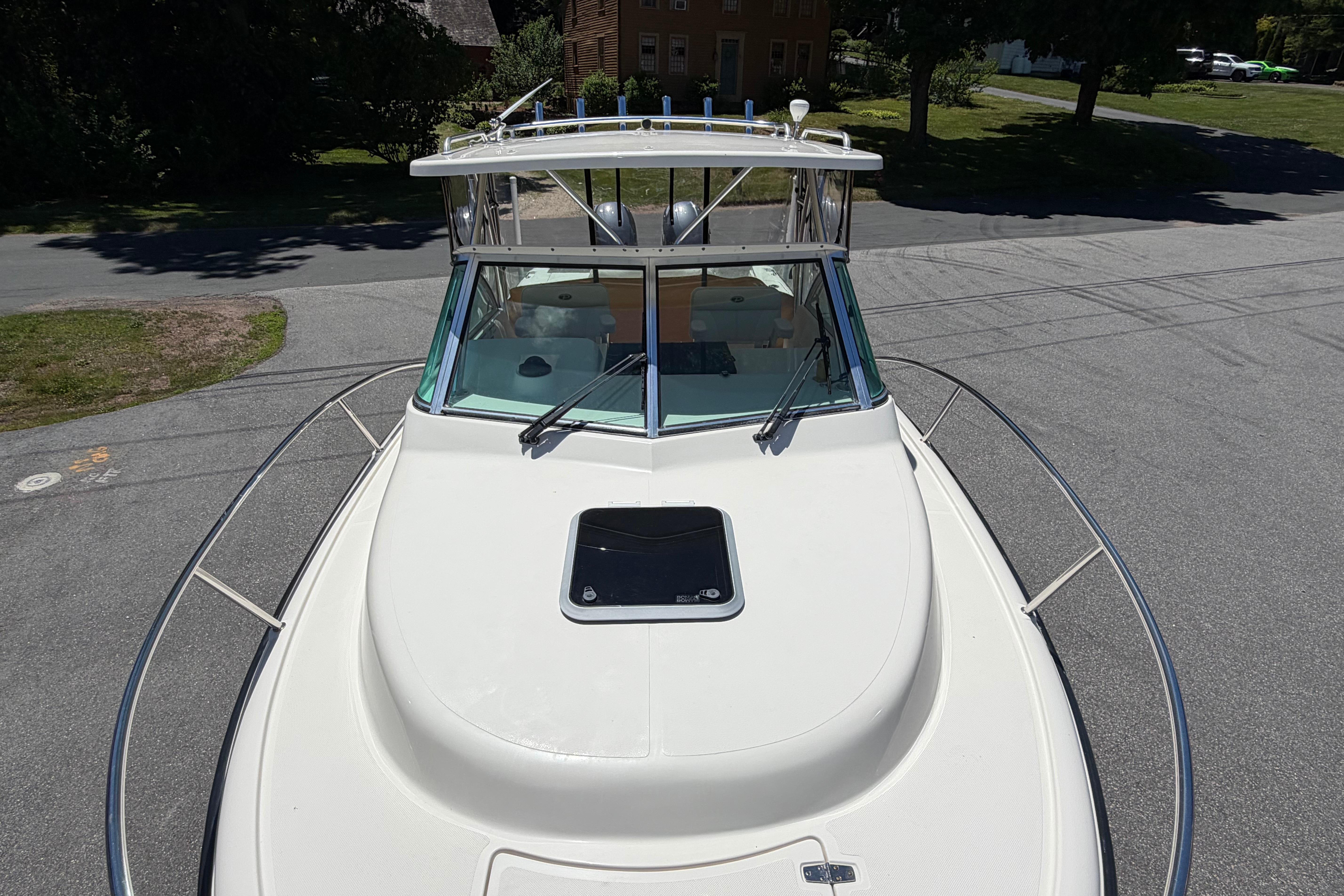 2010 Pursuit OS 255 Offshore boat on a trailer, viewed from above.