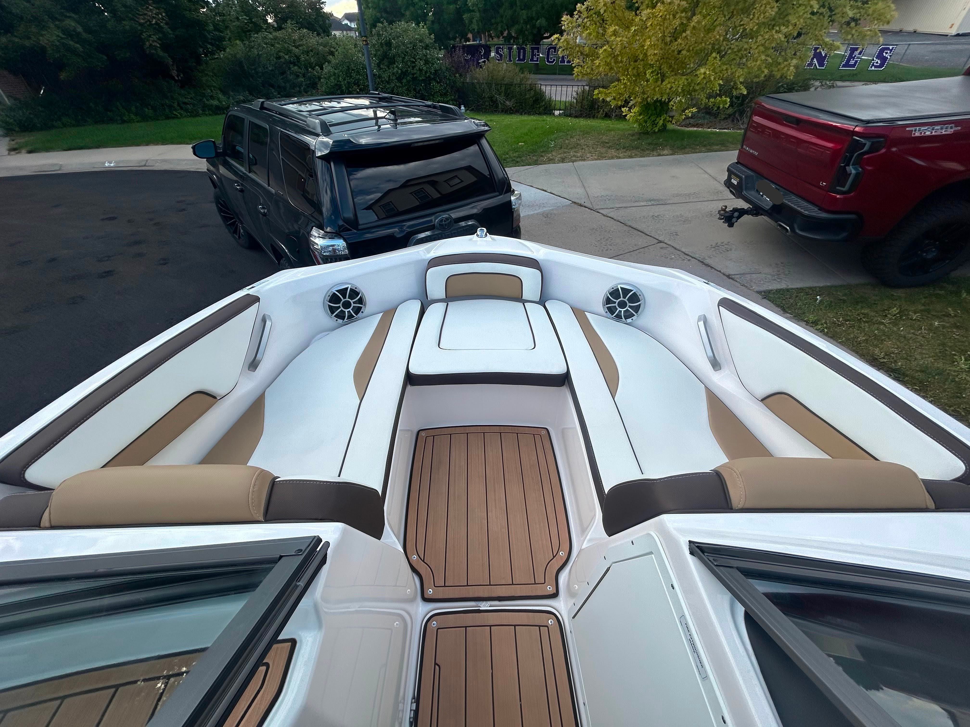 Interior view of a 2022 Yamaha Boats 195S with luxurious seating.
