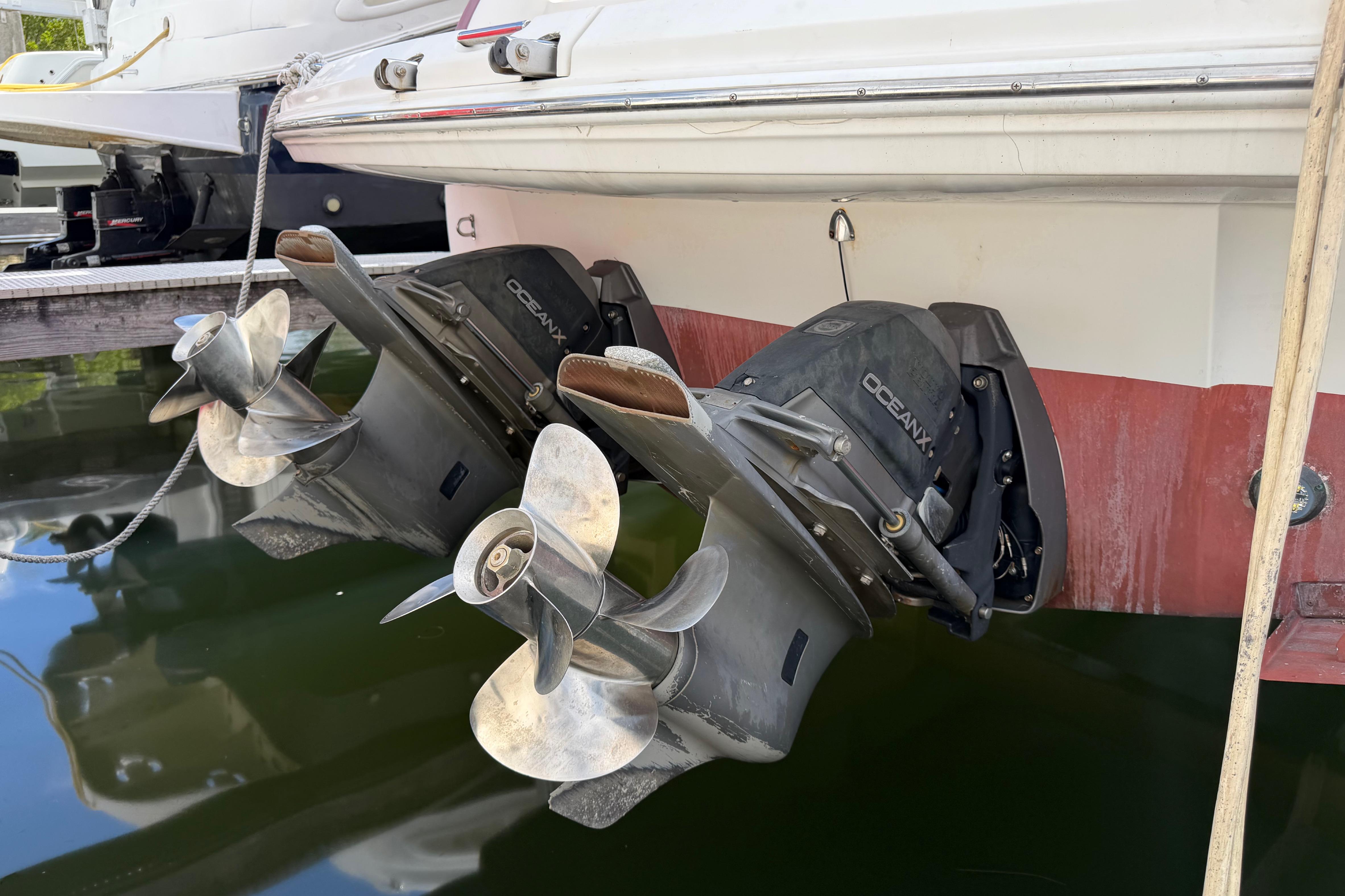2007 Monterey 350 Sport Yacht with dual OceanX outdrives in marina.