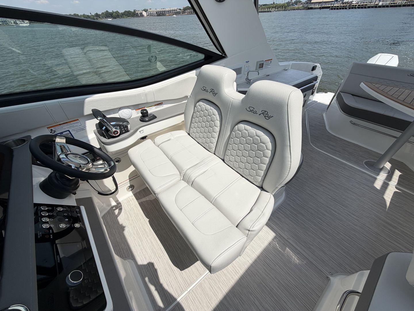 Interior of 2026 Sea Ray Sundancer 320 Outboard with luxurious seating.