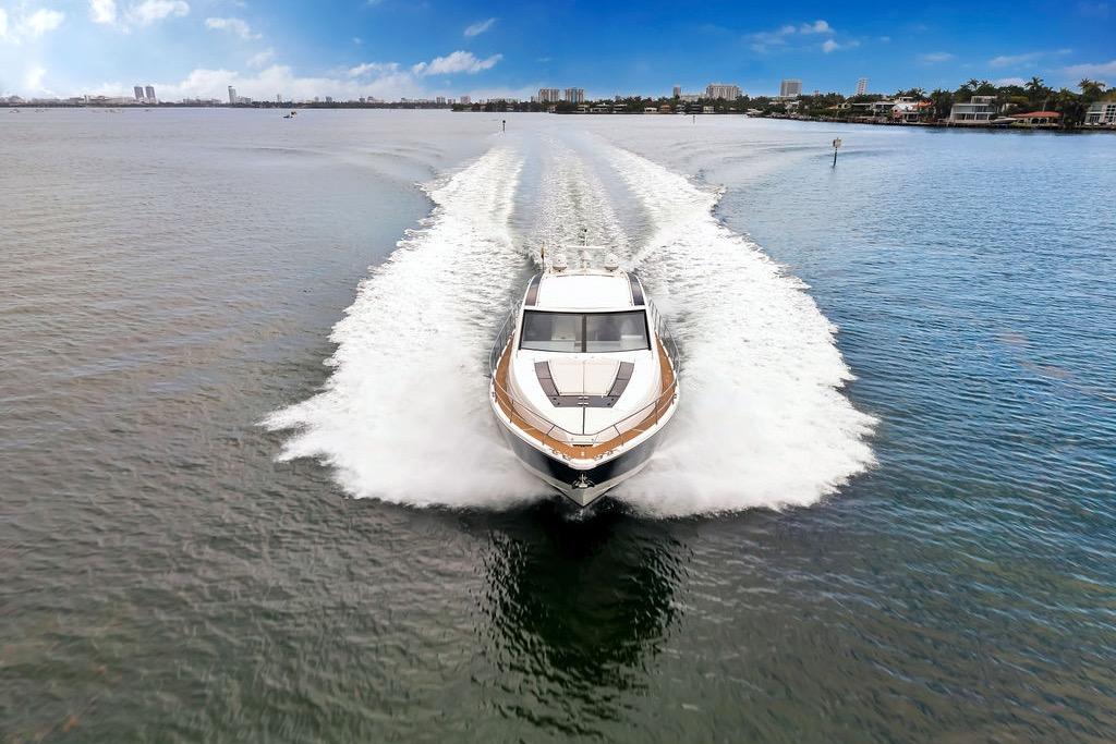 2012 Fairline Targa 58 yacht cruising on open water, leaving a wake behind.
