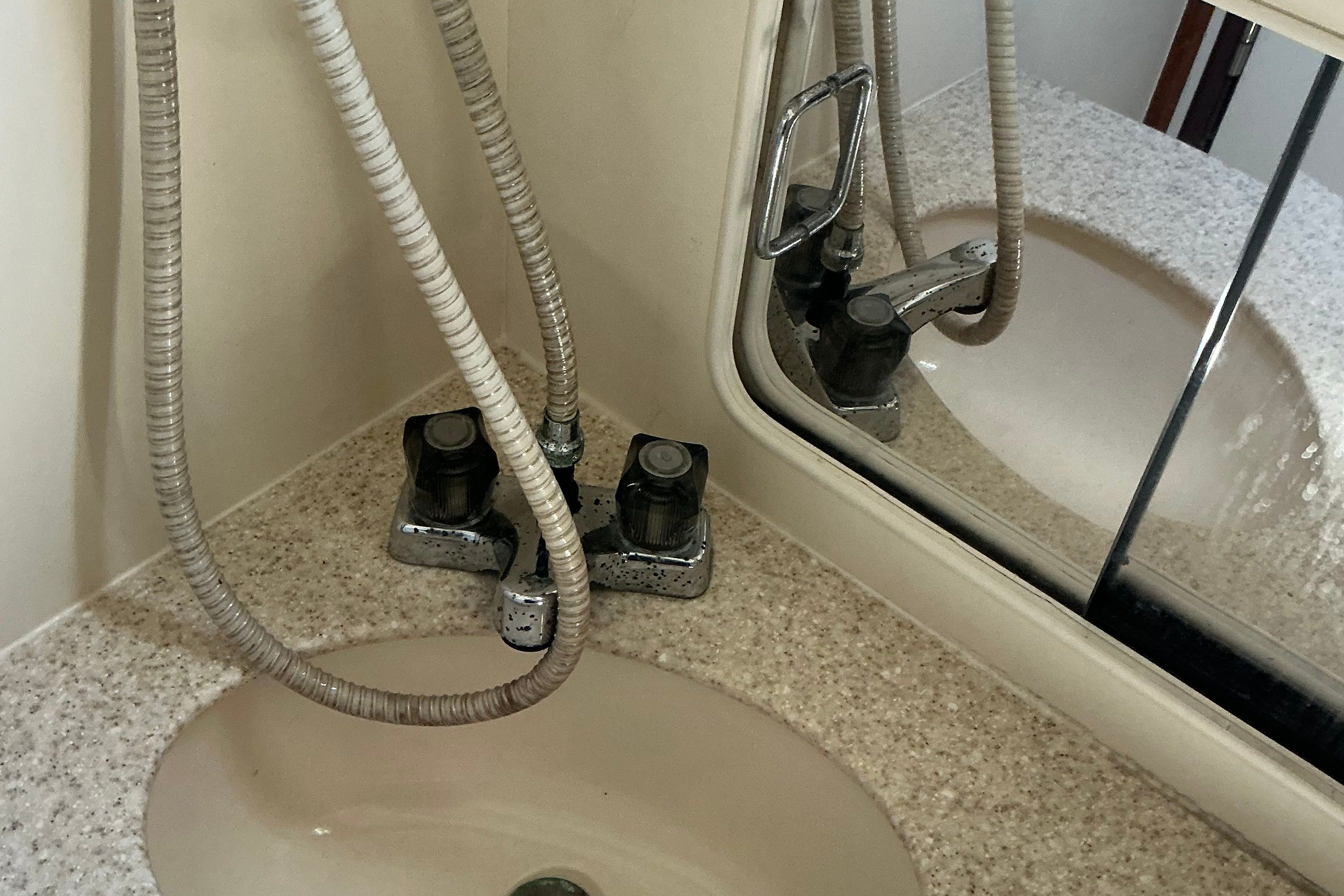 Sink and fixtures on Mainship Pilot 30, year 1999.