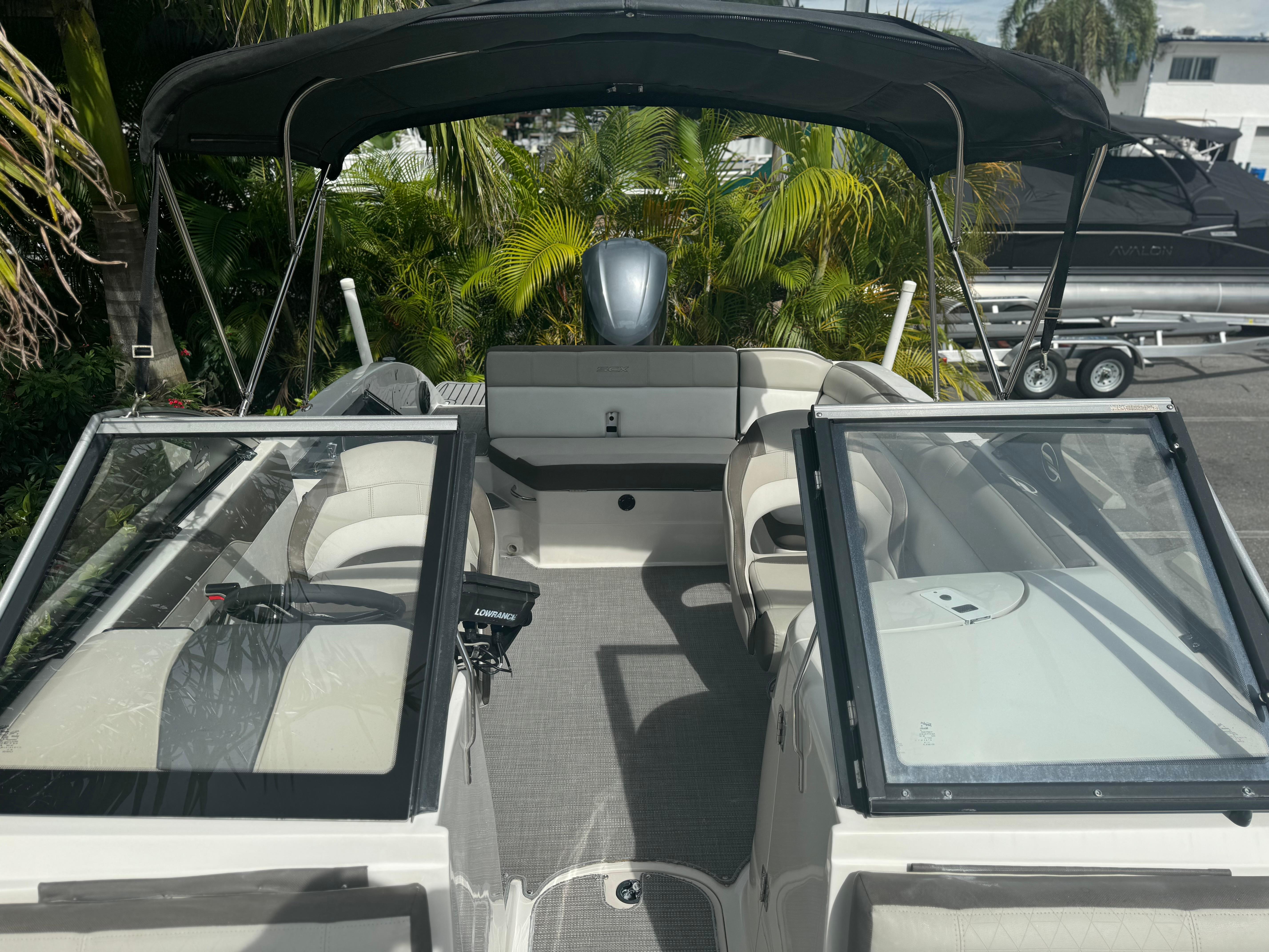 2017 Starcraft 230 OB SCX EXT boat interior with seating and canopy.