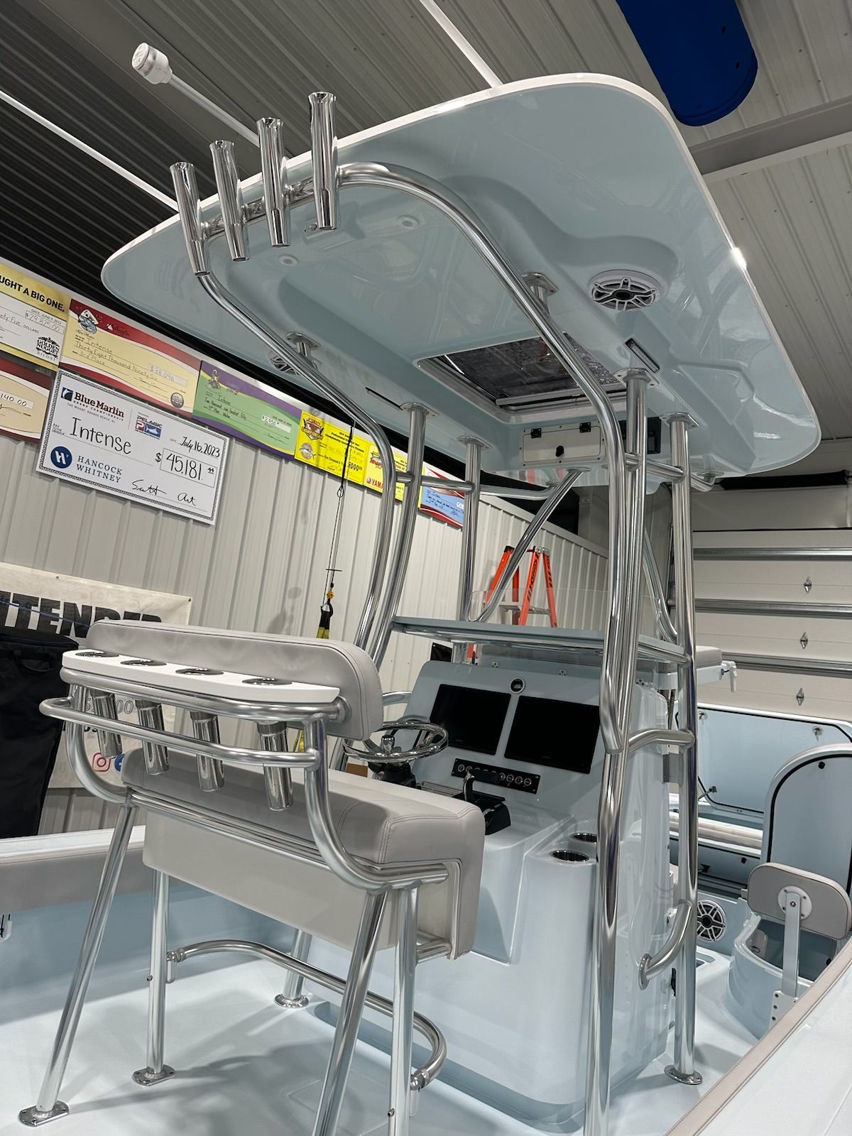 A modern boat with a sleek helm station and polished metal accents.