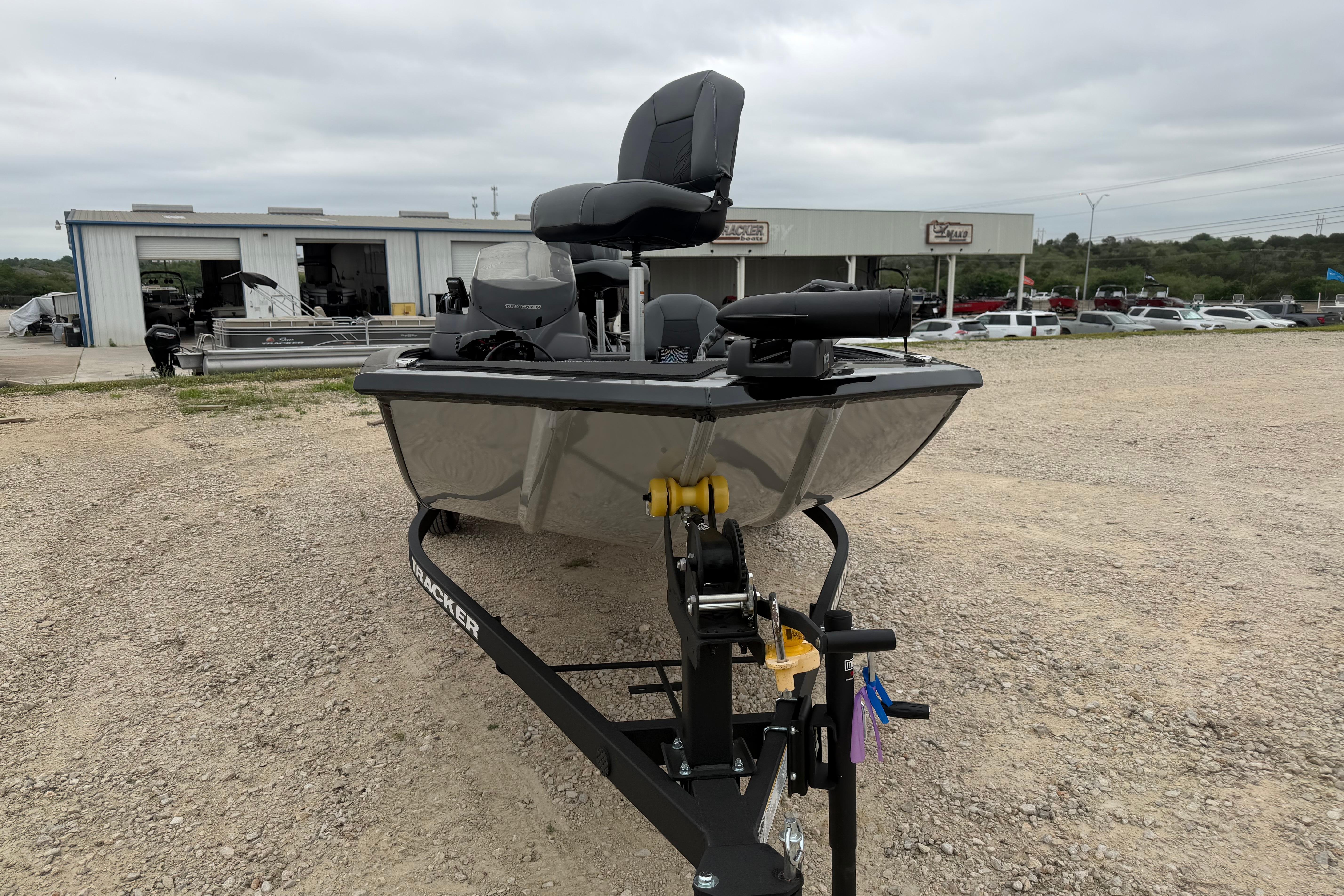 2026 Tracker Pro 170 boat on trailer in outdoor dealership lot.
