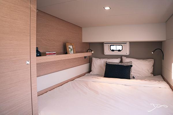 Cozy bedroom in 2025 Nautitech 40 Open yacht with modern design and soft lighting.