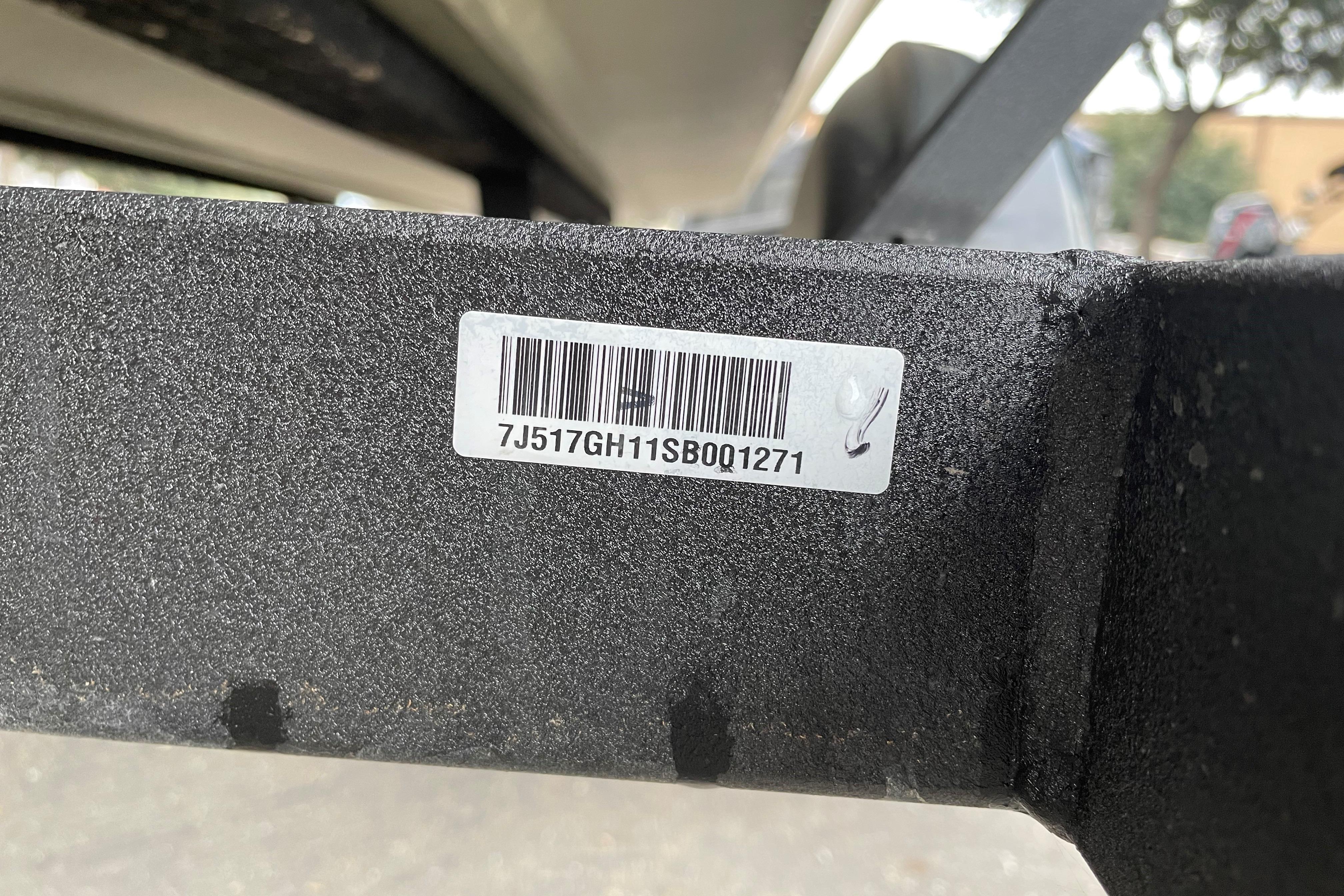 Barcode sticker on 2025 Tracker Grizzly 1754 SC boat trailer frame.