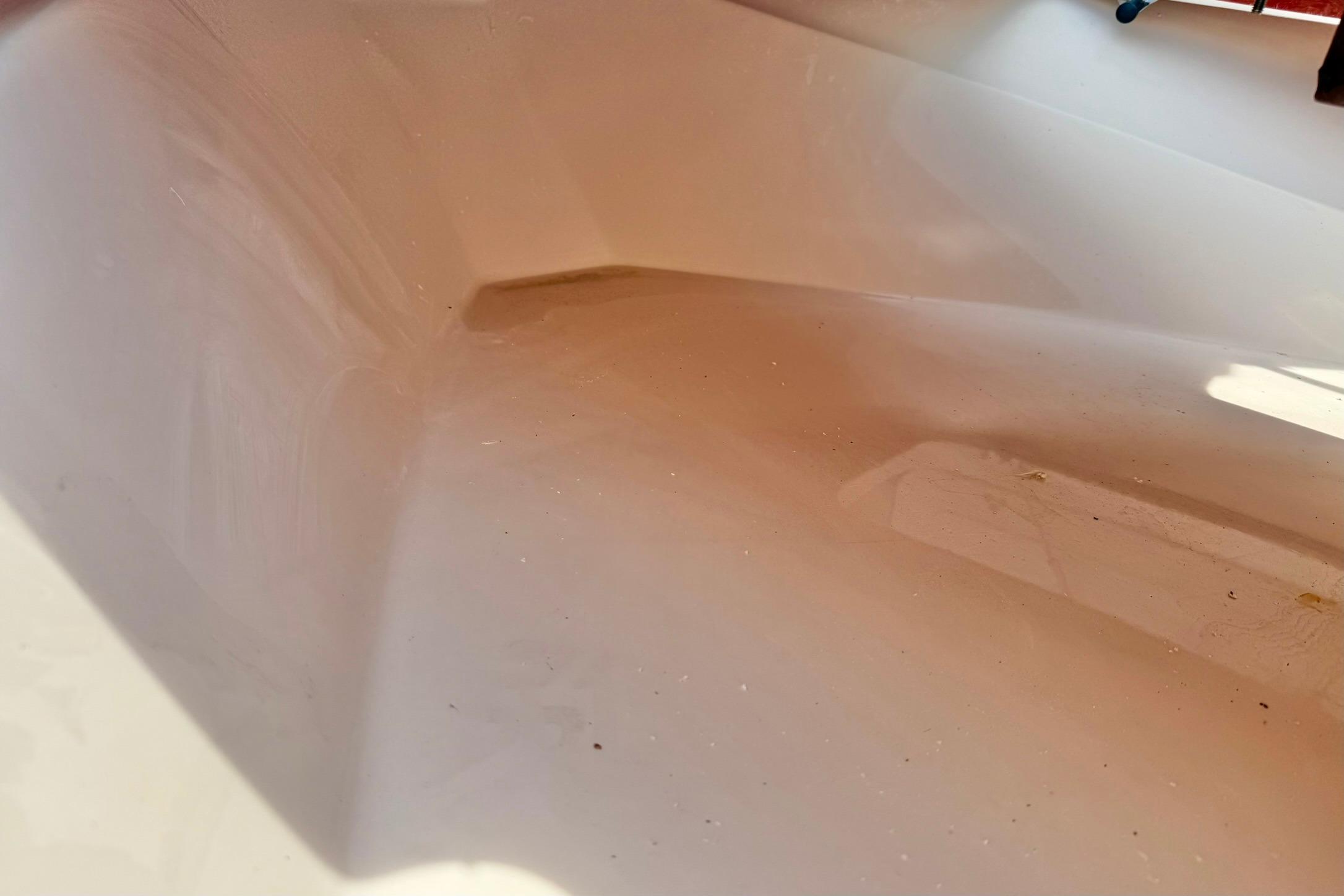 Interior view of a 2026 Carolina Skiff 24 Ultra Elite boat hull.