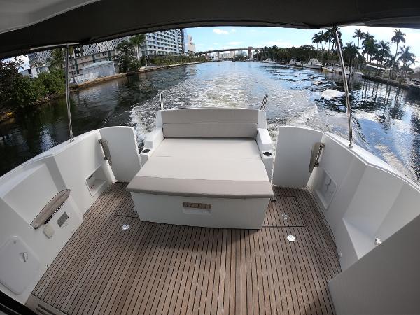 Jeanneau NC 11 2017 boat with spacious deck and waterfront view.
