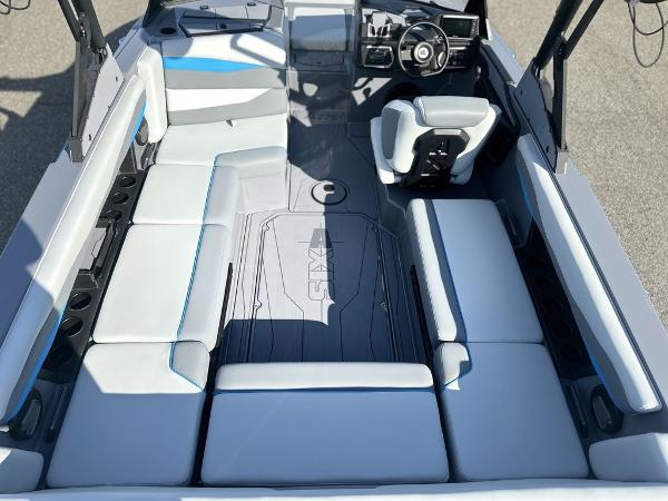 2025 Axis A225 boat interior with sleek seating and modern dashboard design.