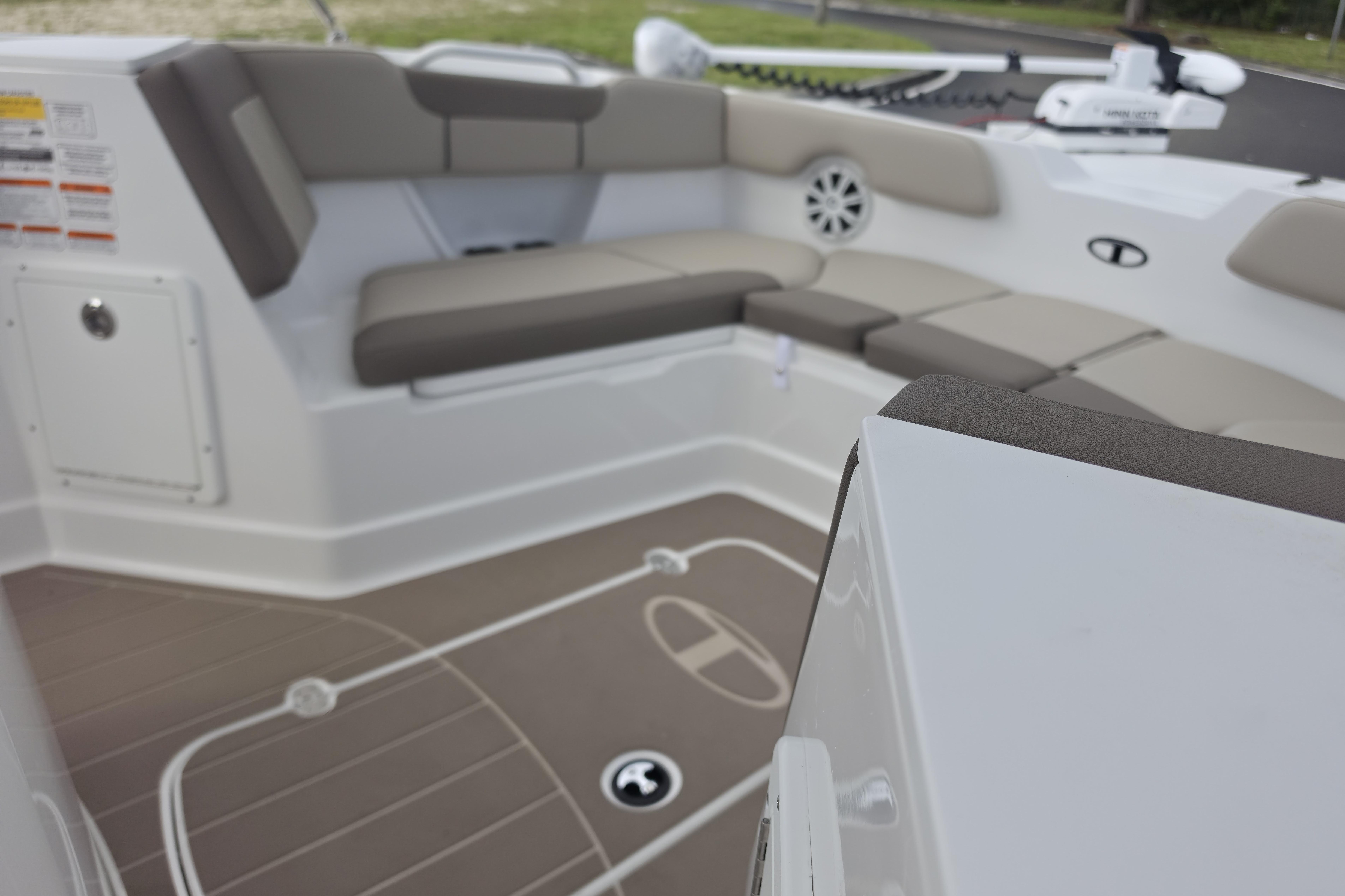 Interior of 2026 Tahoe 2150 CC boat with cushioned seating and modern design.