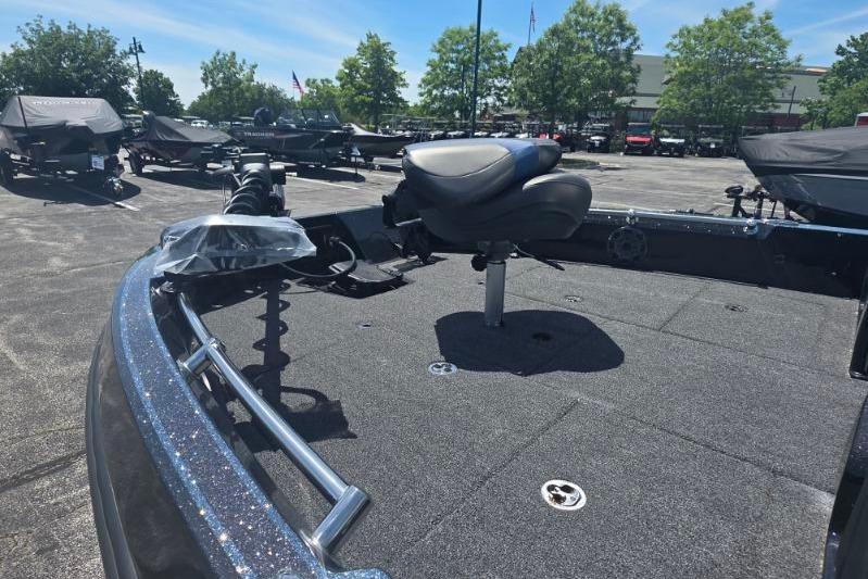 2026 Nitro ZV20 Pro boat with seating, parked outdoors under clear sky.