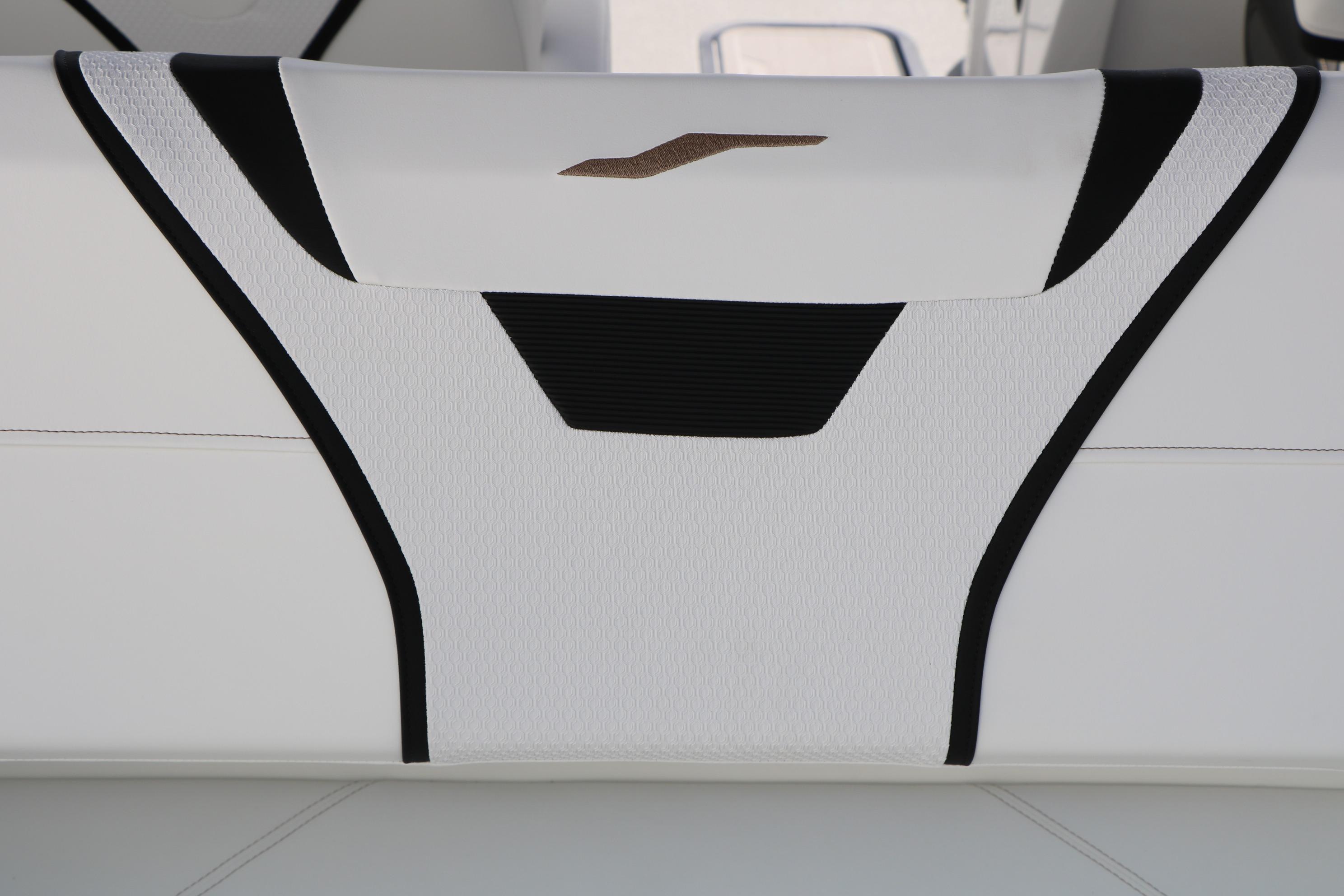 Luxury seating detail on 2026 Evotti 725 CS Tri-Toon boat.