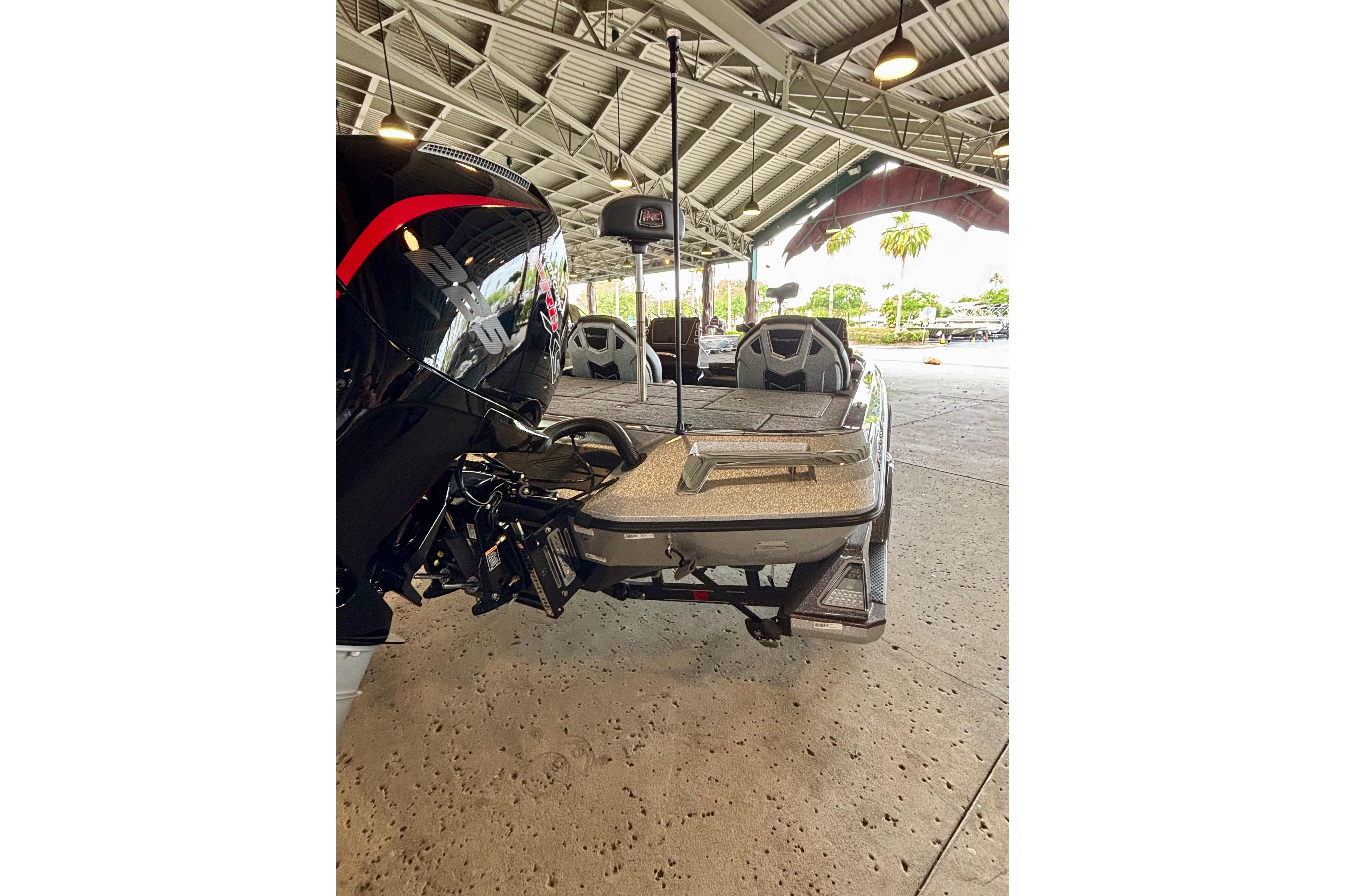 2025 Ranger Z519R boat under a metal roof, showcasing its sleek design and powerful engine.