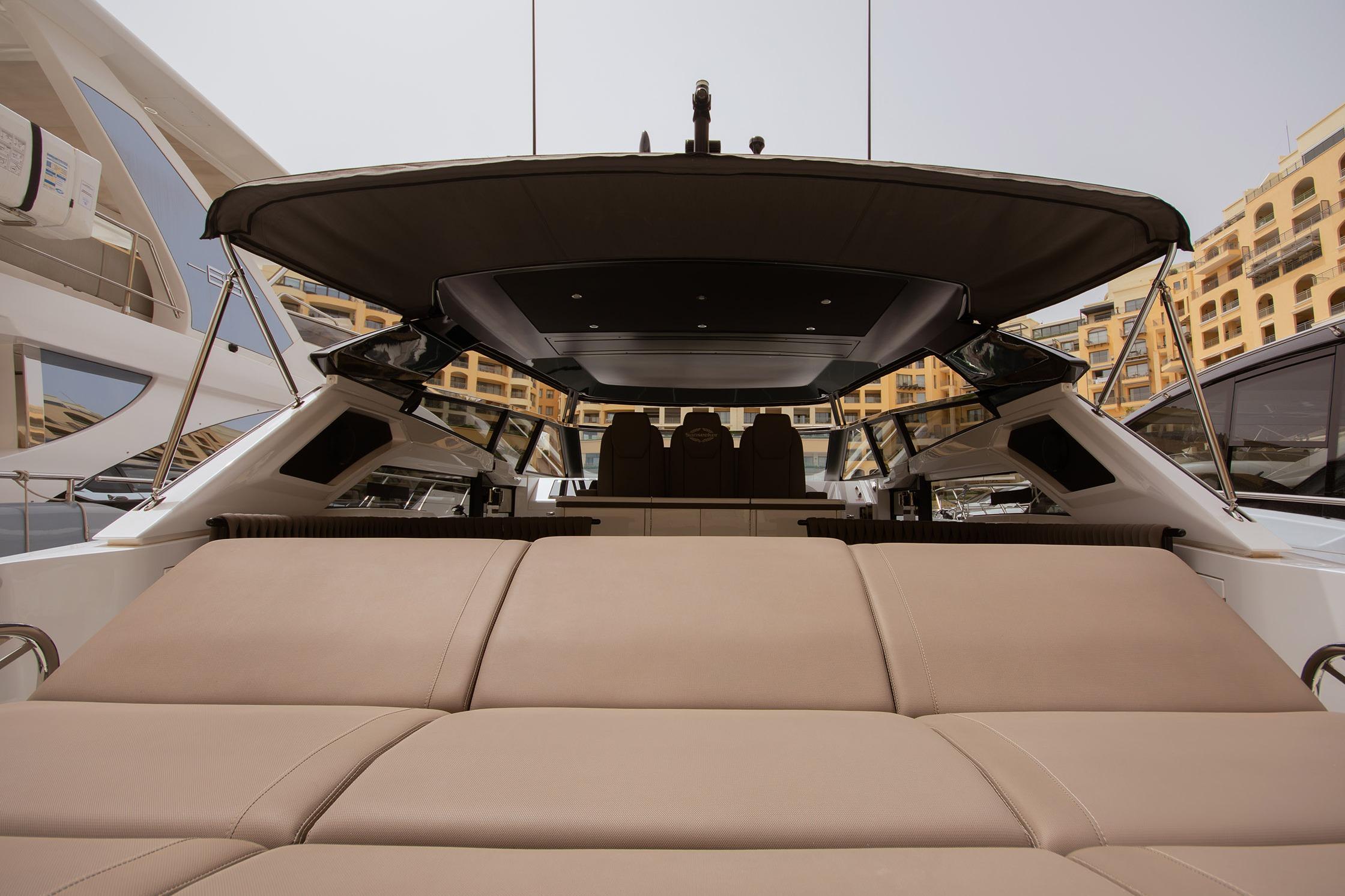 2024 Sunseeker Superhawk 55 yacht with luxurious seating and sleek design.