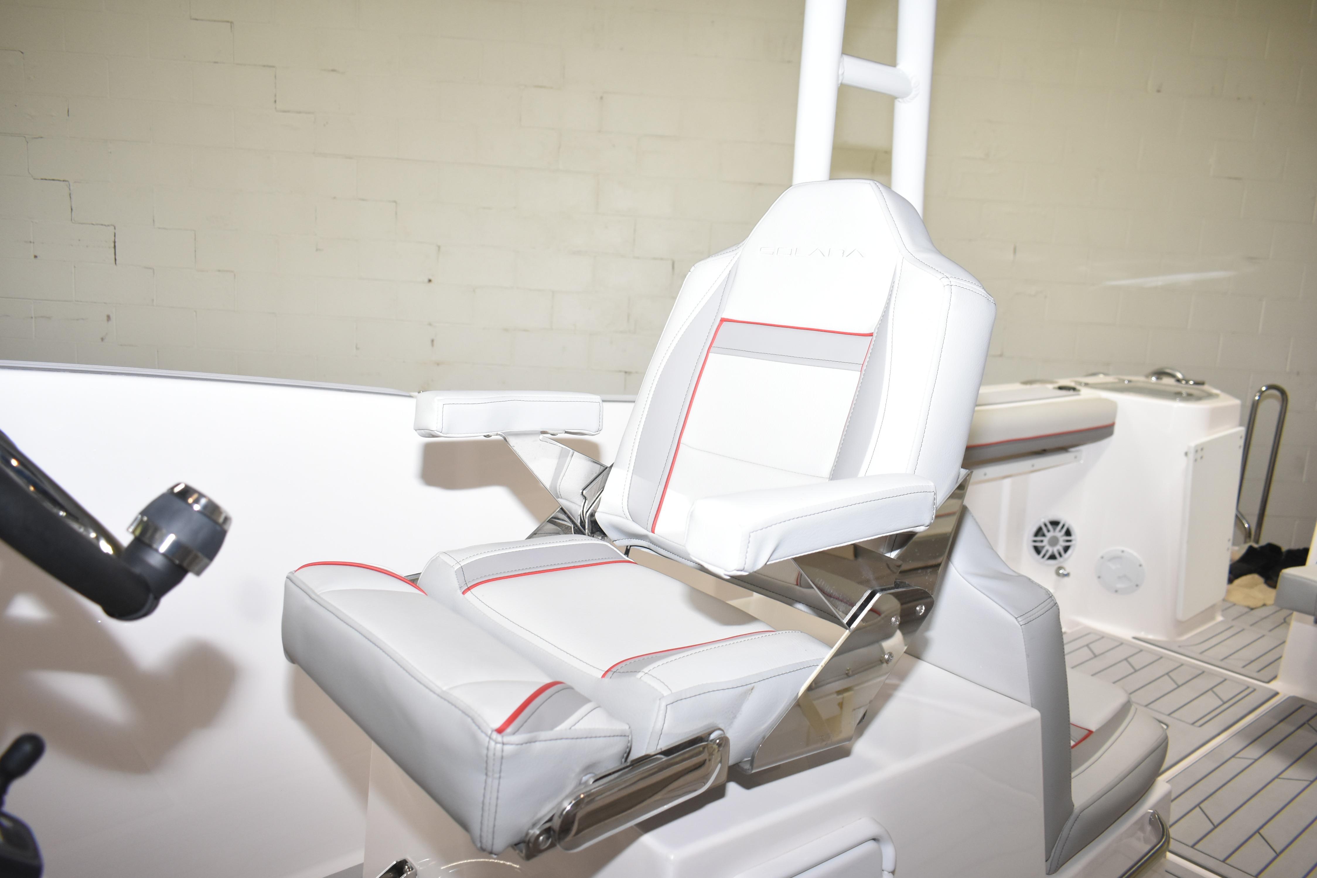 2025 Solara S-310 CW boat seat with white and red accents in a modern interior.