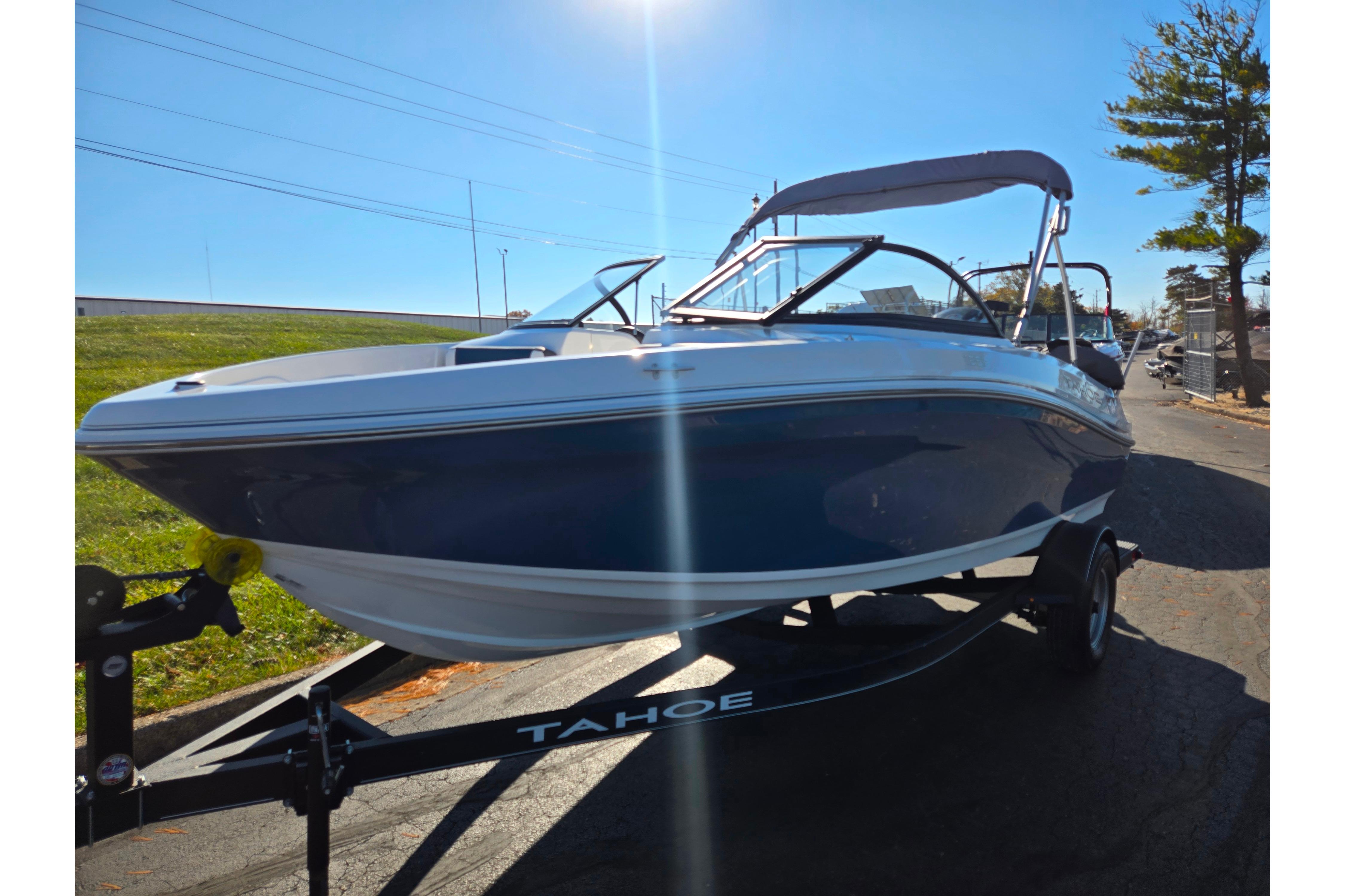 2023 Tahoe 185 S boat on trailer, sunny day, outdoor setting.